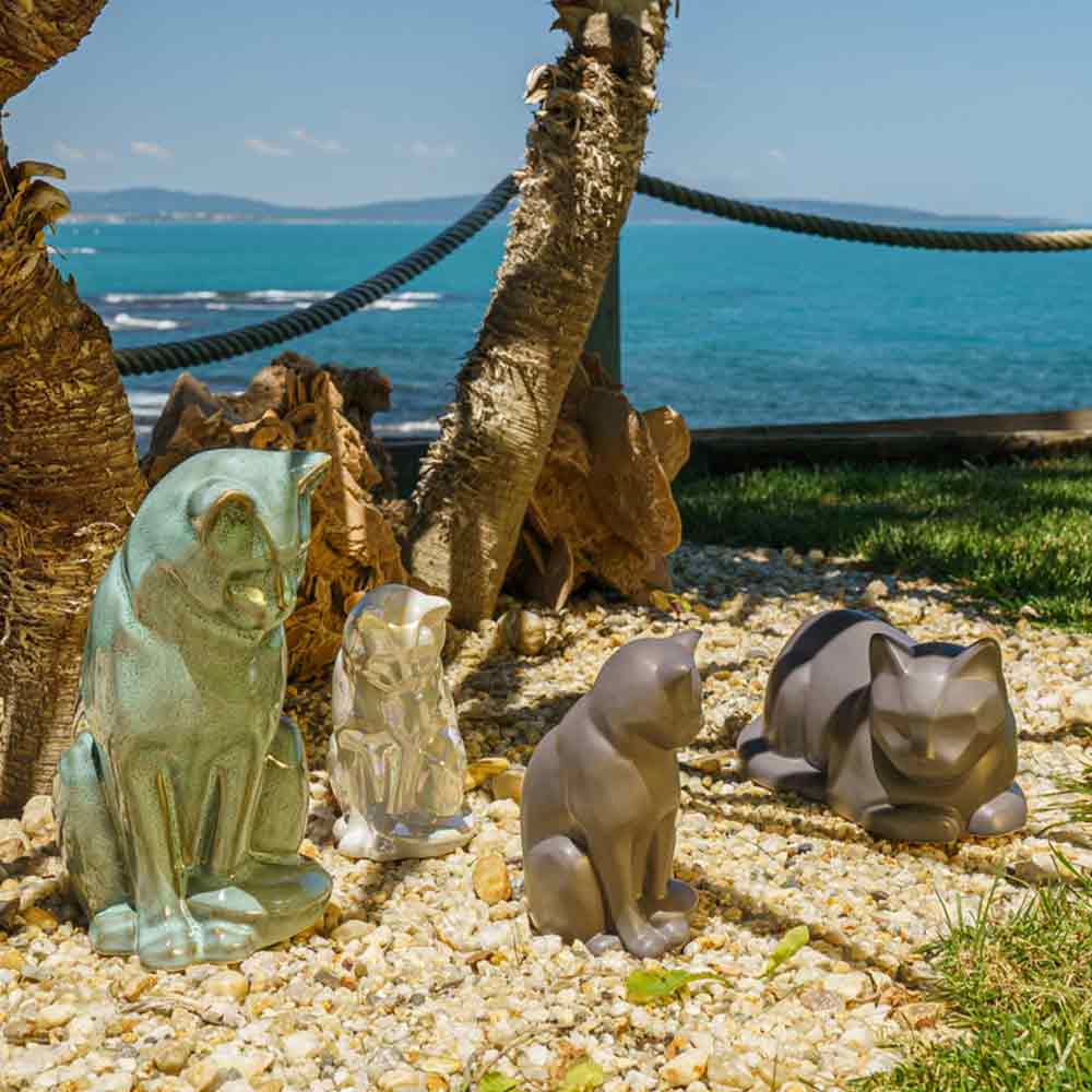 Cat Urns For Ashes Outside In The Sun Different Colours