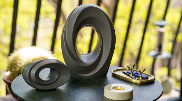 5 black cremation urns