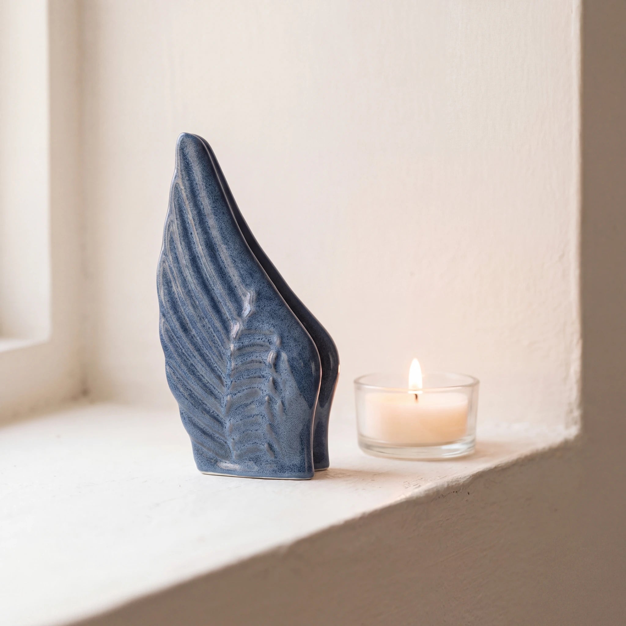 Angel-Wings-Small-Urn-for-Ashes-in-Blue-keepsake_tealight_ledge