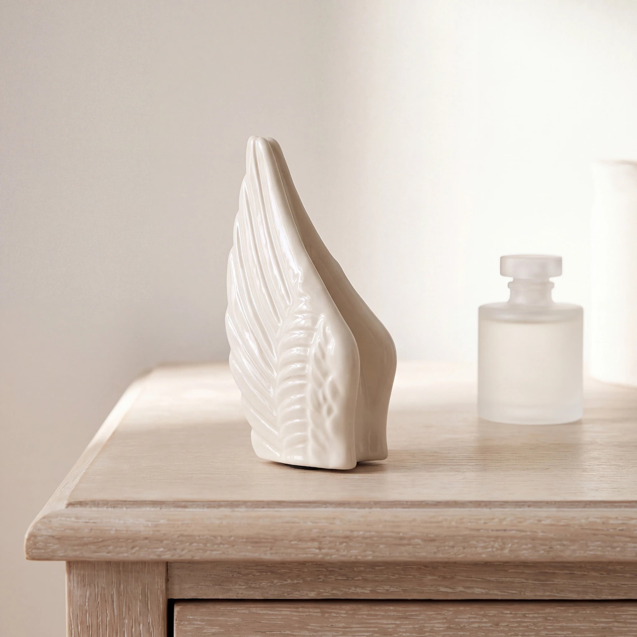 Angel-Wings-Small-Urn-for-Ashes-in-Cream-keepsake_scent_bottle