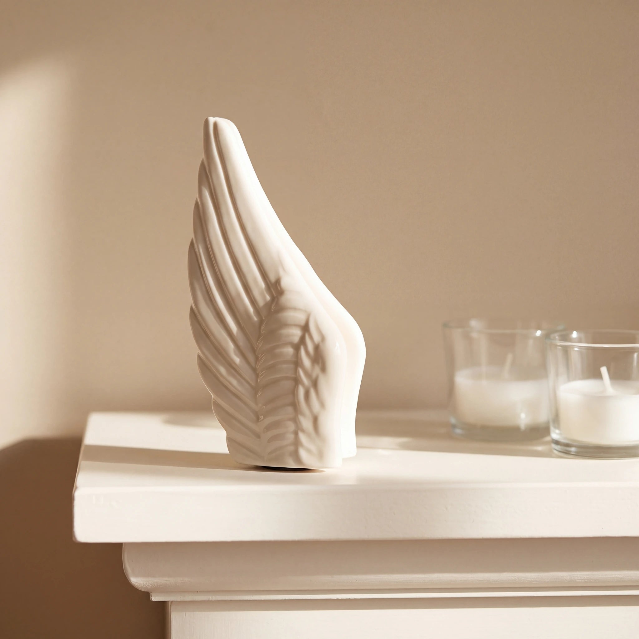 Angel-Wings-Small-Urn-for-Ashes-in-Cream-keepsake_tealight_pair