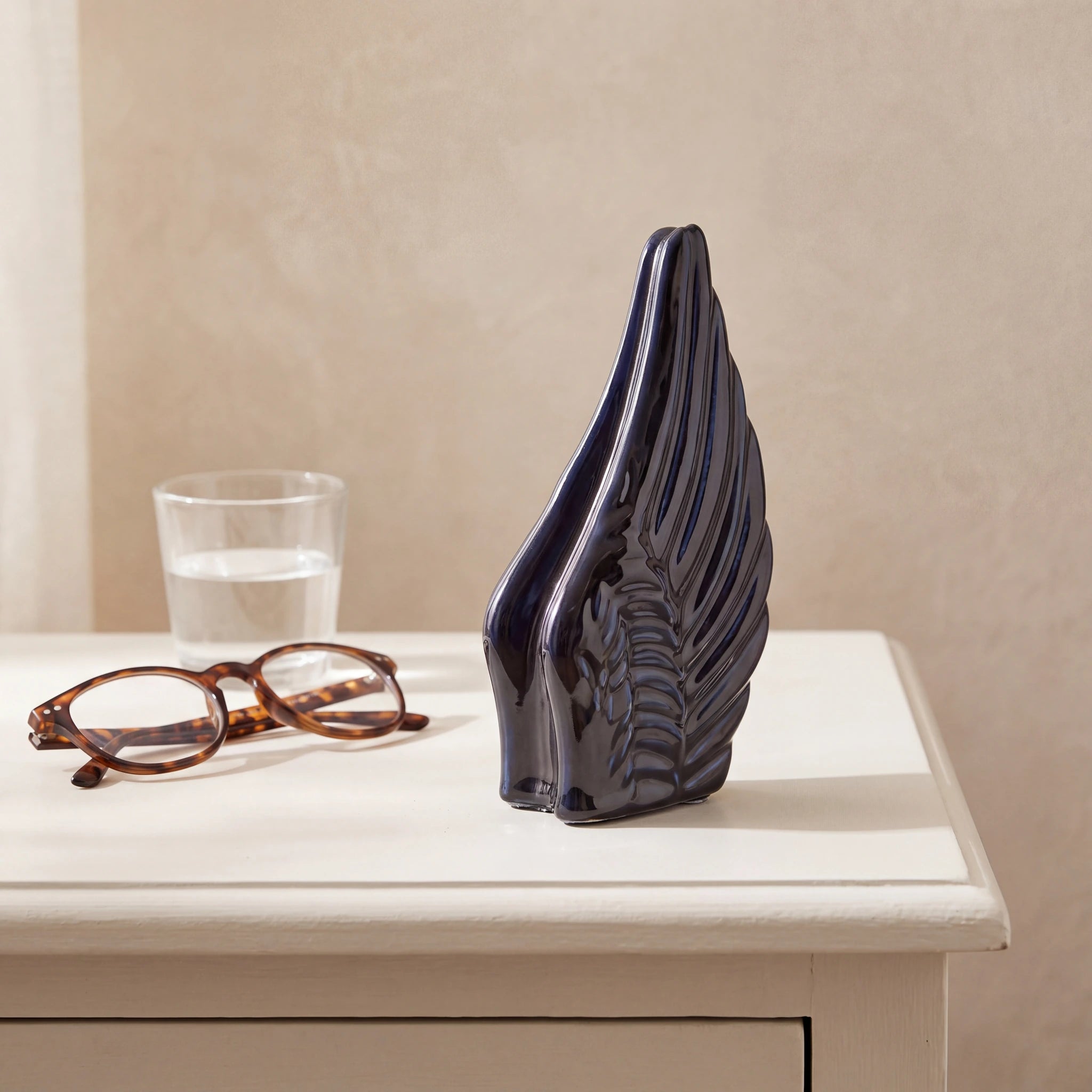 Angel-Wings-Small-Urn-for-Ashes-in-Metallic-Blue-keepsake_bedside_glasses
