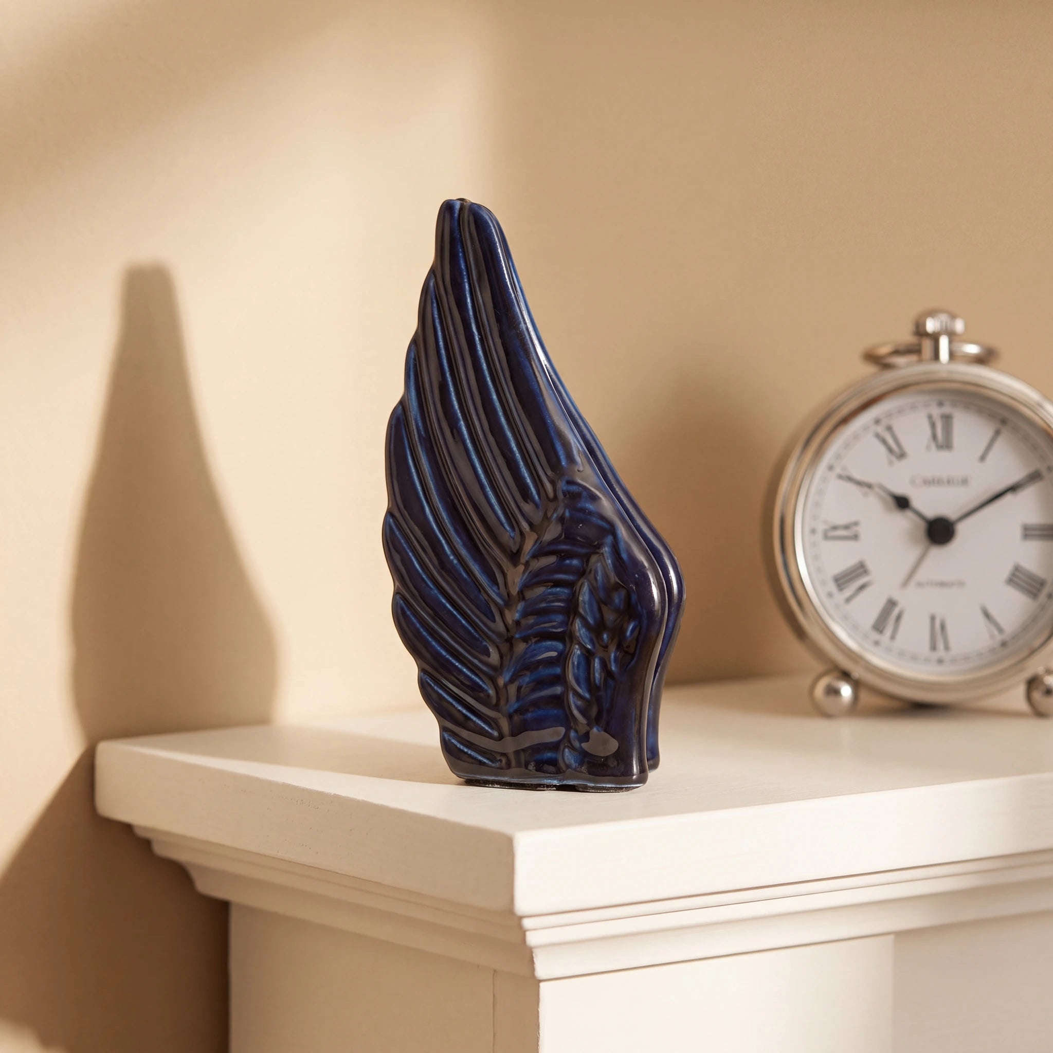 Angel-Wings-Small-Urn-for-Ashes-in-Metallic-Blue-keepsake_candle_clock