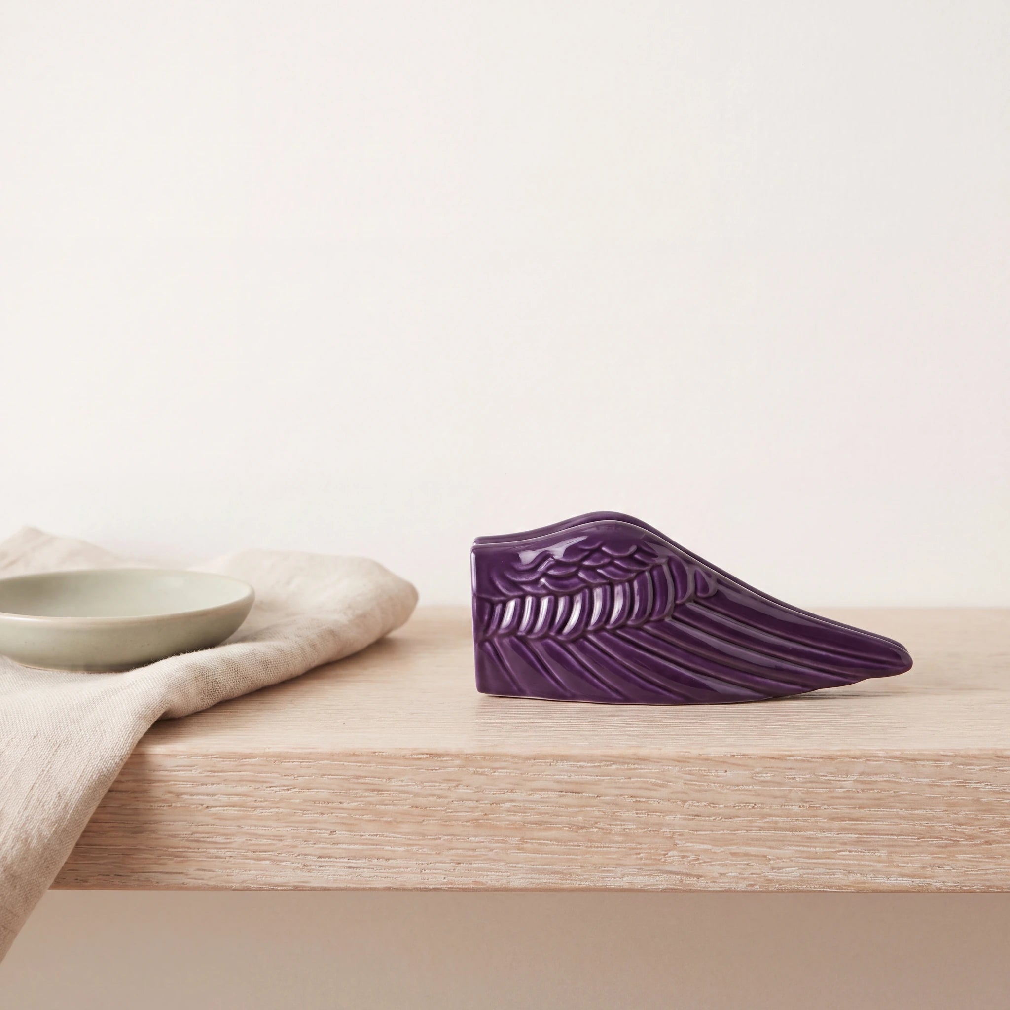 Angel-Wings-Small-Urn-for-Ashes-in-Purple-keepsake_folded_napkin