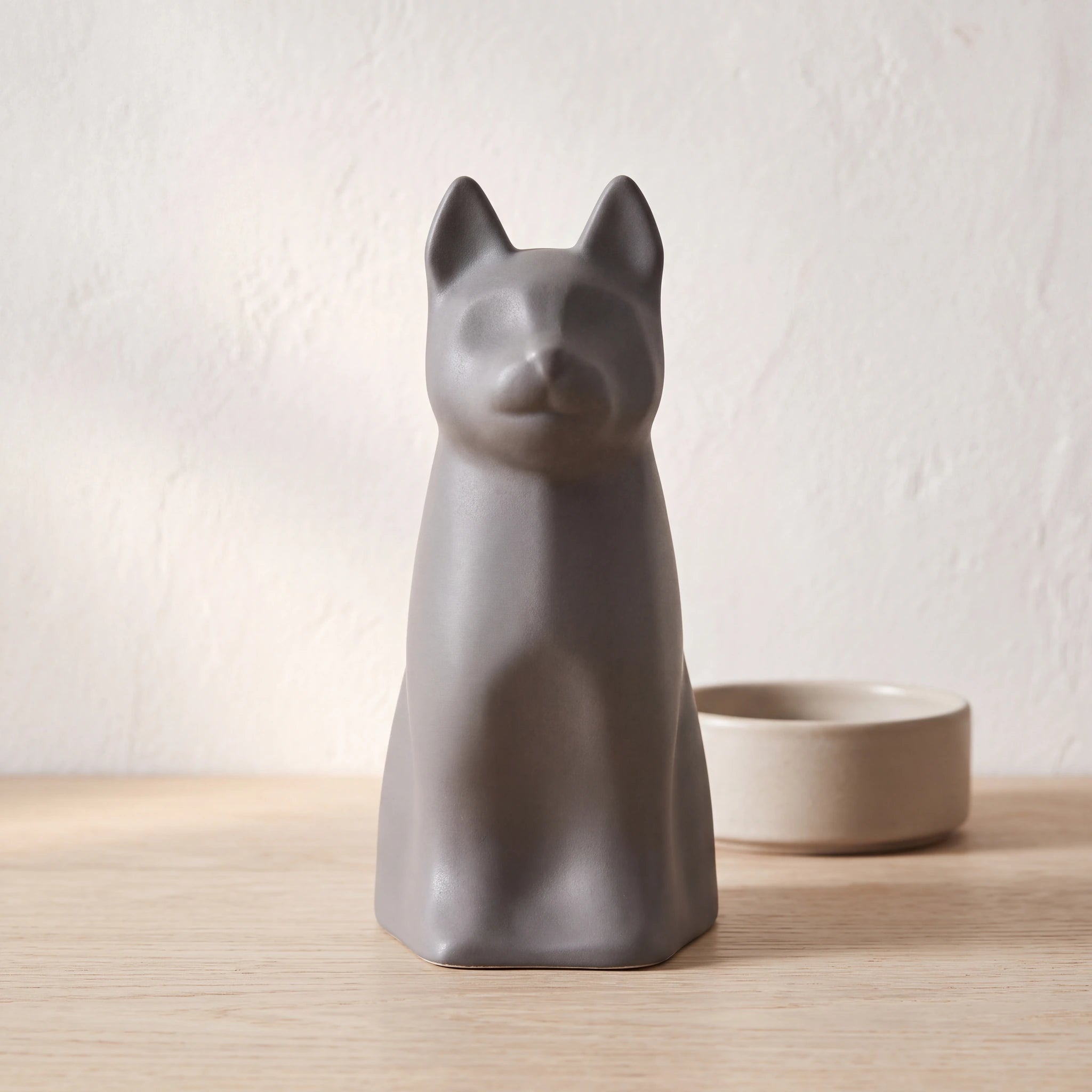 Barkley-Dog-Urn-for-Ashes-in-Matte-Grey-pet_bowl_ledge
