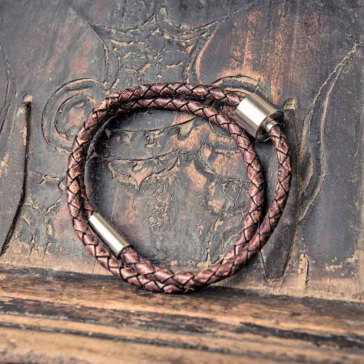 Braided Leather Ashes Bracelet for Men in Brown on Table