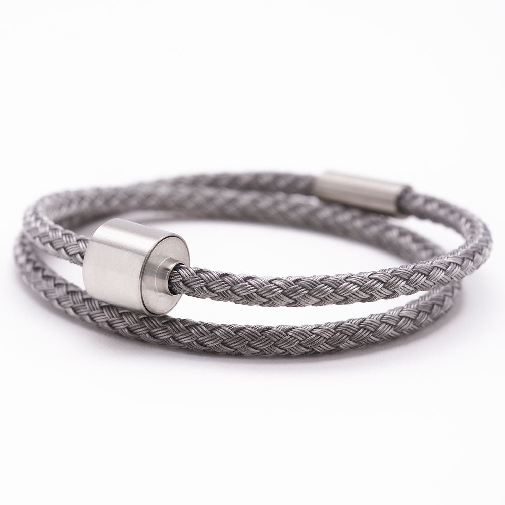 Braided Stainless Steel Ashes Bracelet for Men in Silver White Background Close Up