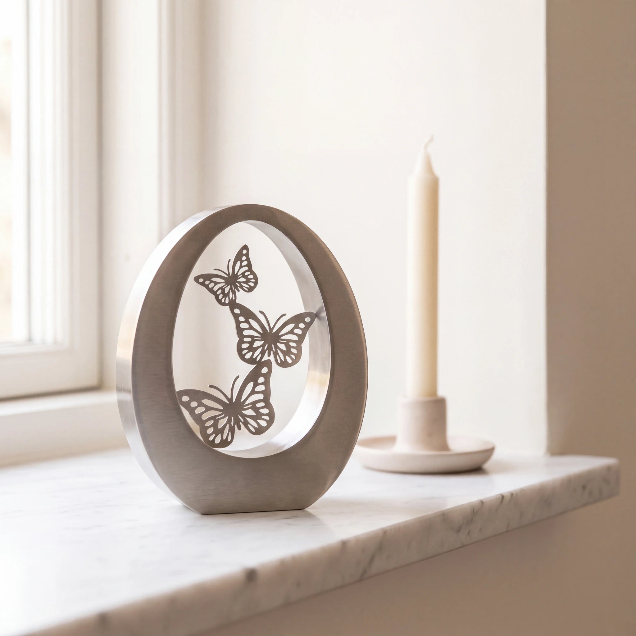 Butterfly-Small-Urn-for-Ashes-in-Stainless-Steel-Marble-Ledge