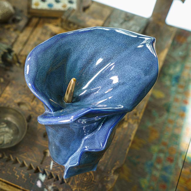 Calla Lilly Medium Cremation Urn for Ashes Blue Top View on Coffee Table