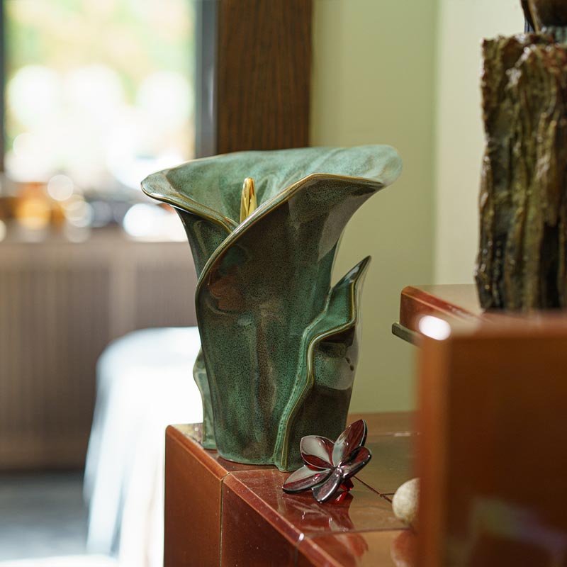 Calla Lilly Medium Cremation Urn for Ashes Oily Green Near Window
