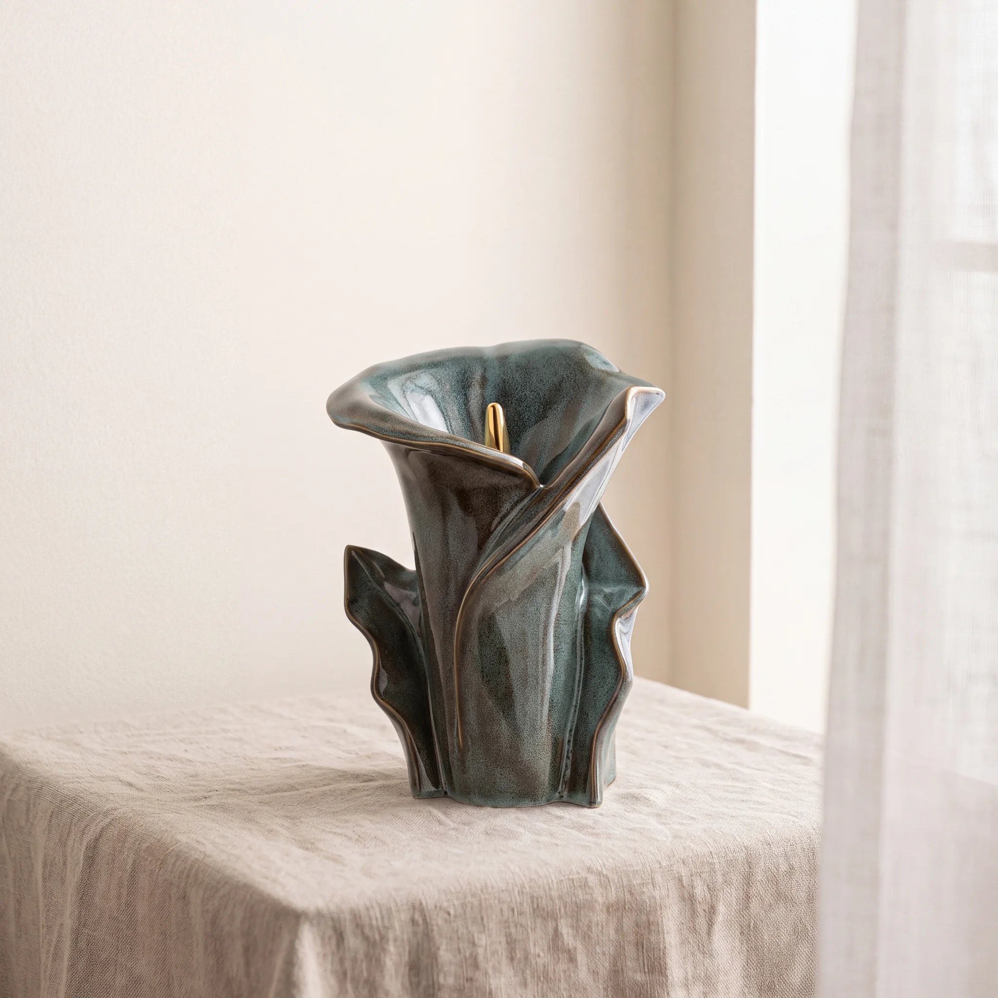 Calla-Lily-Medium-Urn-for-Ashes-in-Oily-Green-Linen-Table