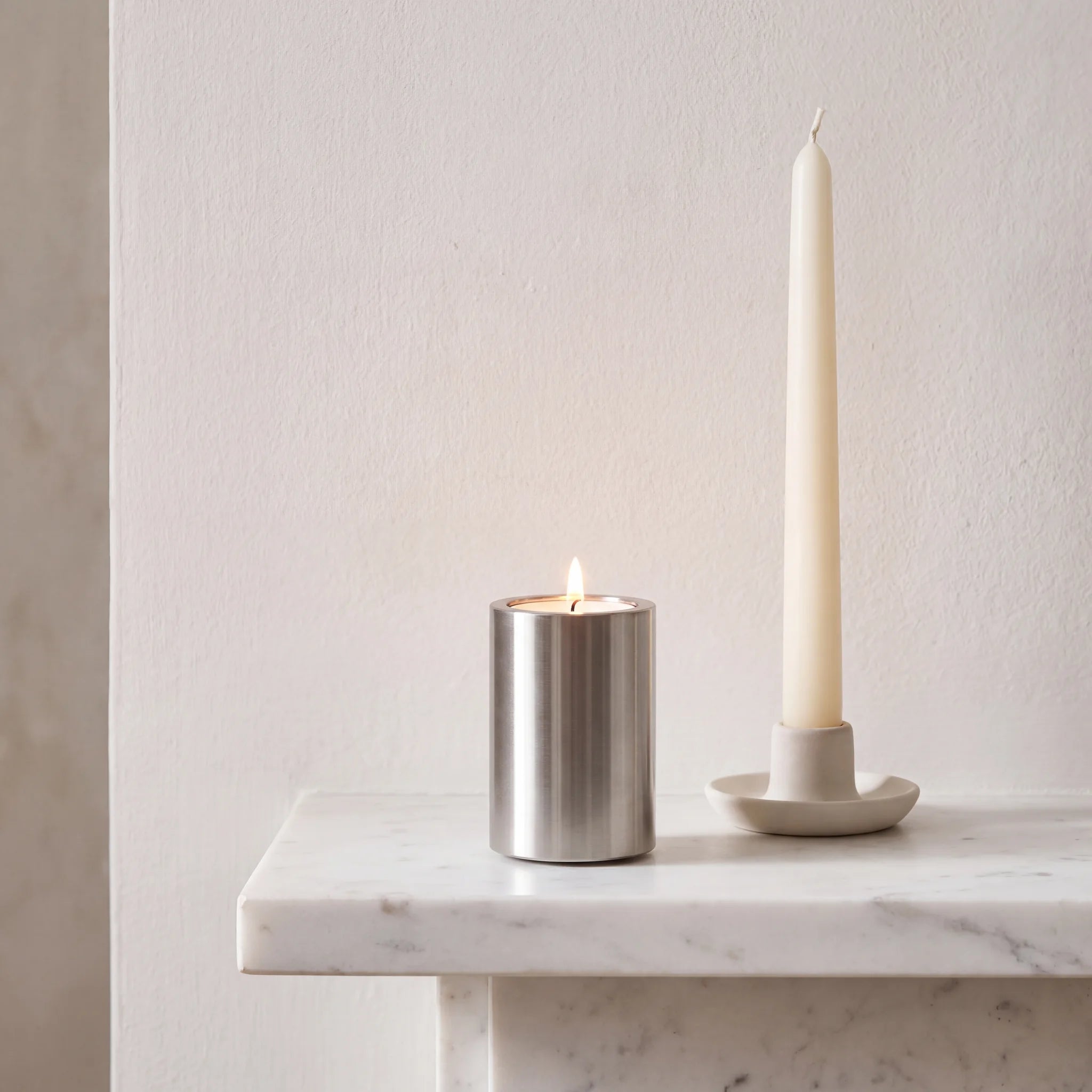 Candle-Extra-Small-Urn-for-Ashes-in-Stainless-Steel-Marble-Ledge