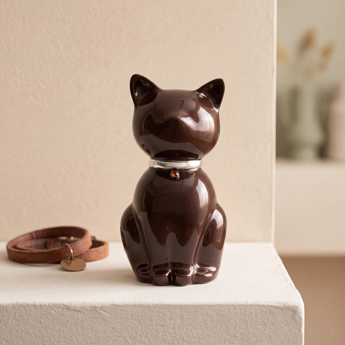 Cat-Urn-for-Ashes-in-Brown-Silver-pet_collar_ledge
