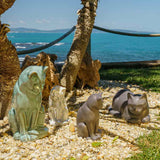 Cat Urns For Ashes Outside In The Sun Different Colours Matte Grey Oily Green And Pearly White Light