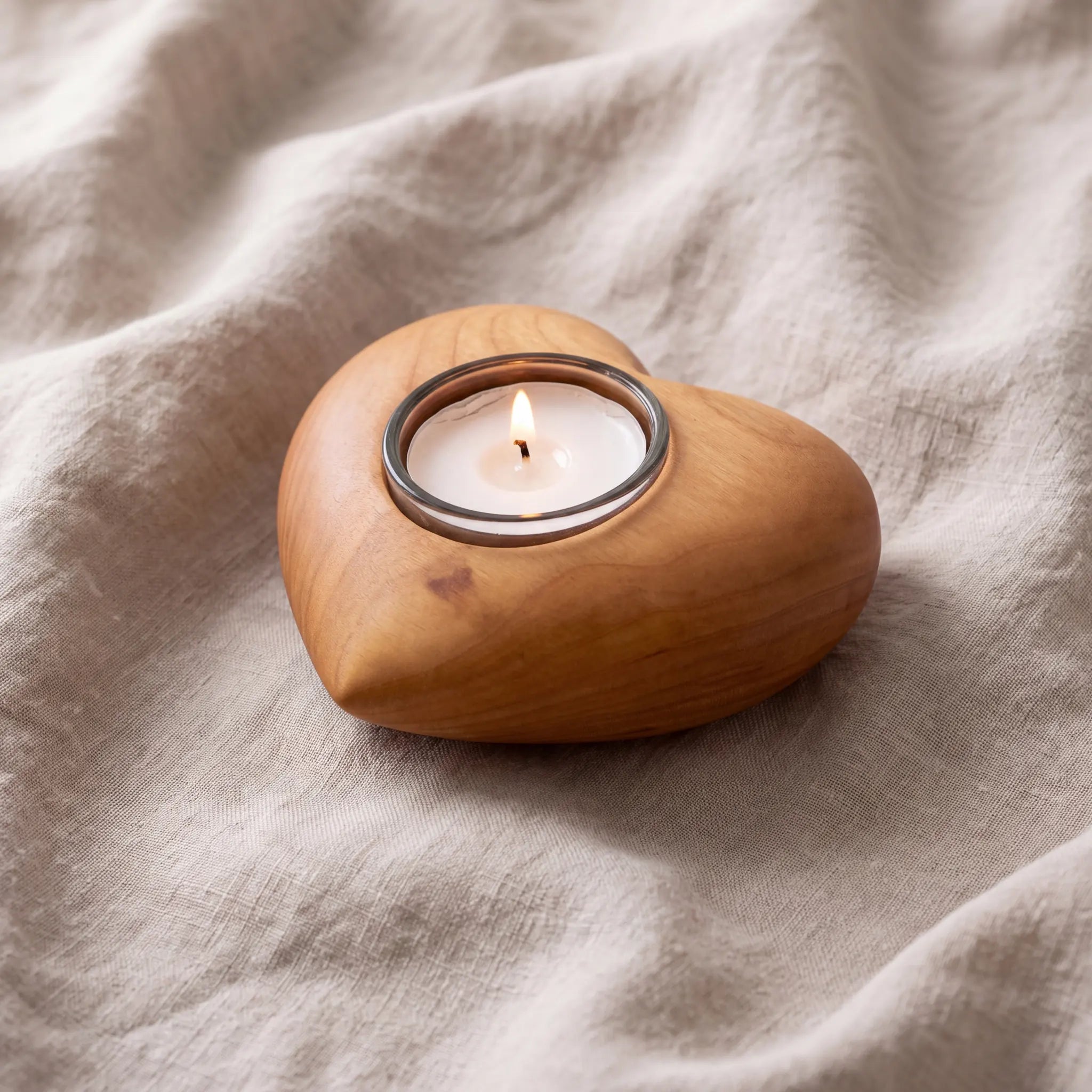 Cherry-Wood-Heart-Candle-Holder-Keepsake-Urn-For-Ashes-On-Linen