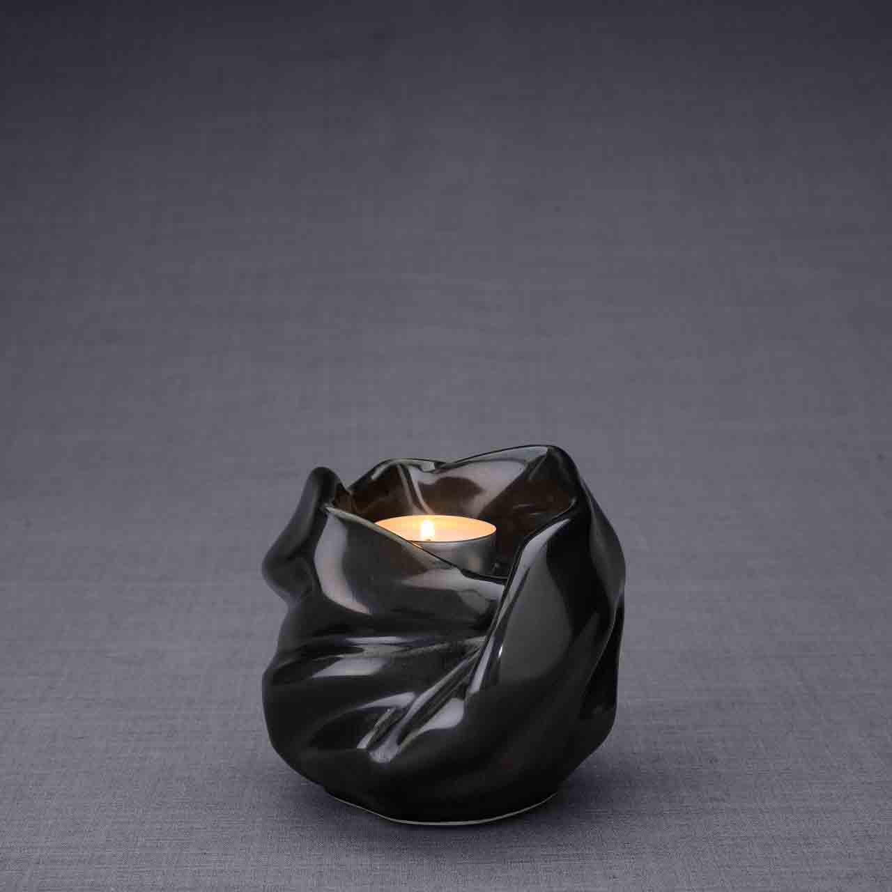 Comfort Candle Ashes Keepsake Urn in Glossy Black Dark Background