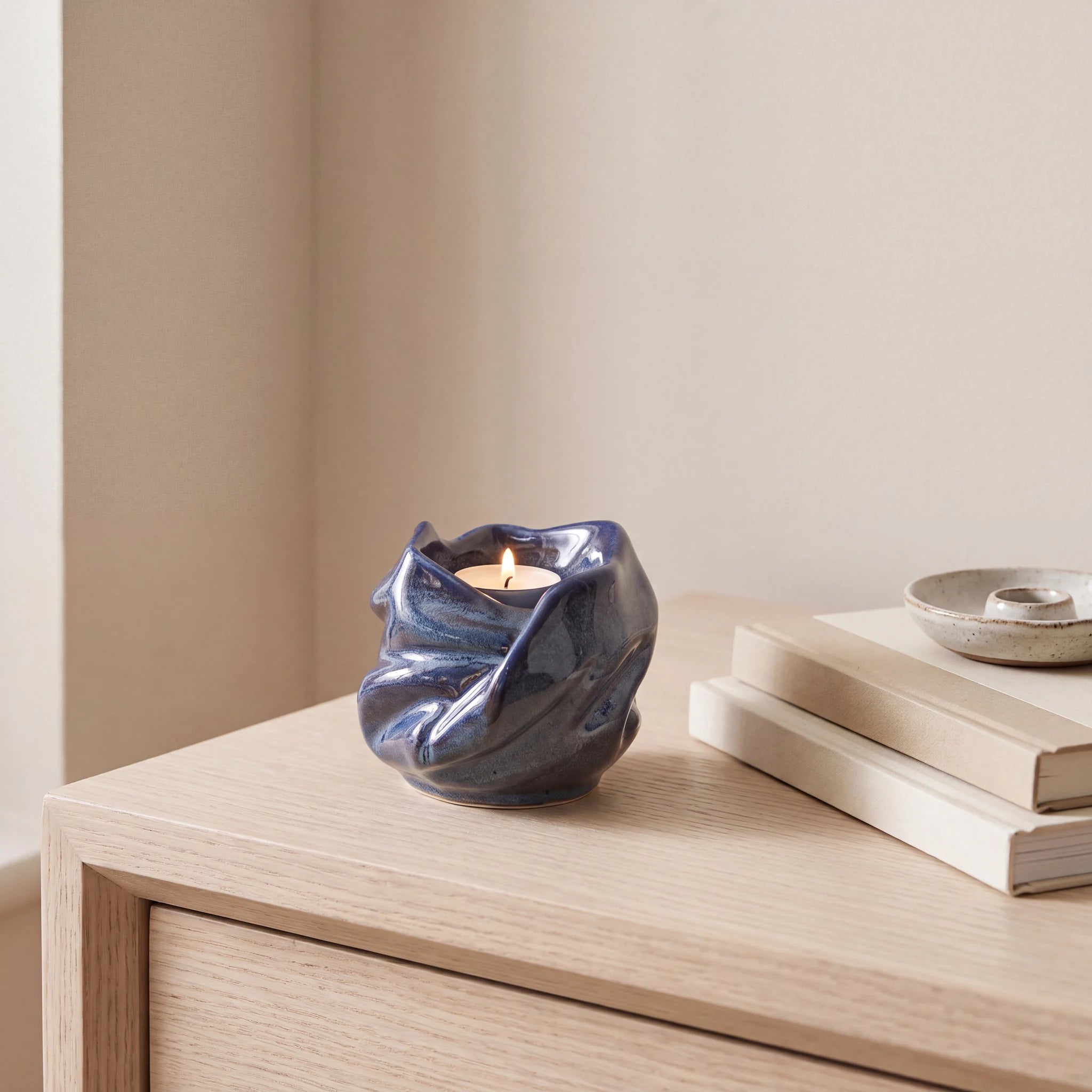 Comfort-Candle-Small-Urn-for-Ashes-in-Blue-keepsake_books_dish-Left-Angle