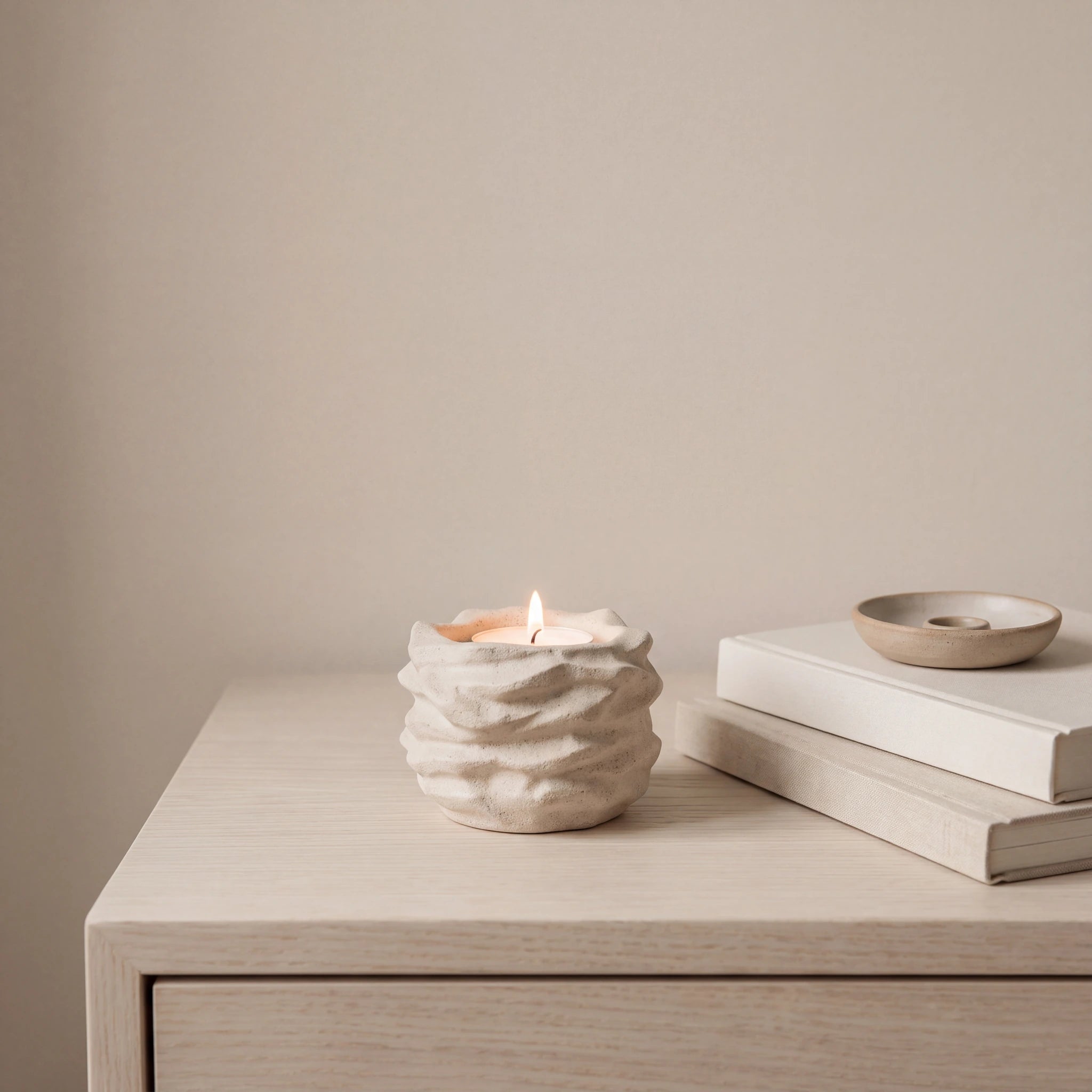 Comfort-Candle-Small-Urn-for-Ashes-in-Light-Sand-keepsake_books_dish-Left-Angle