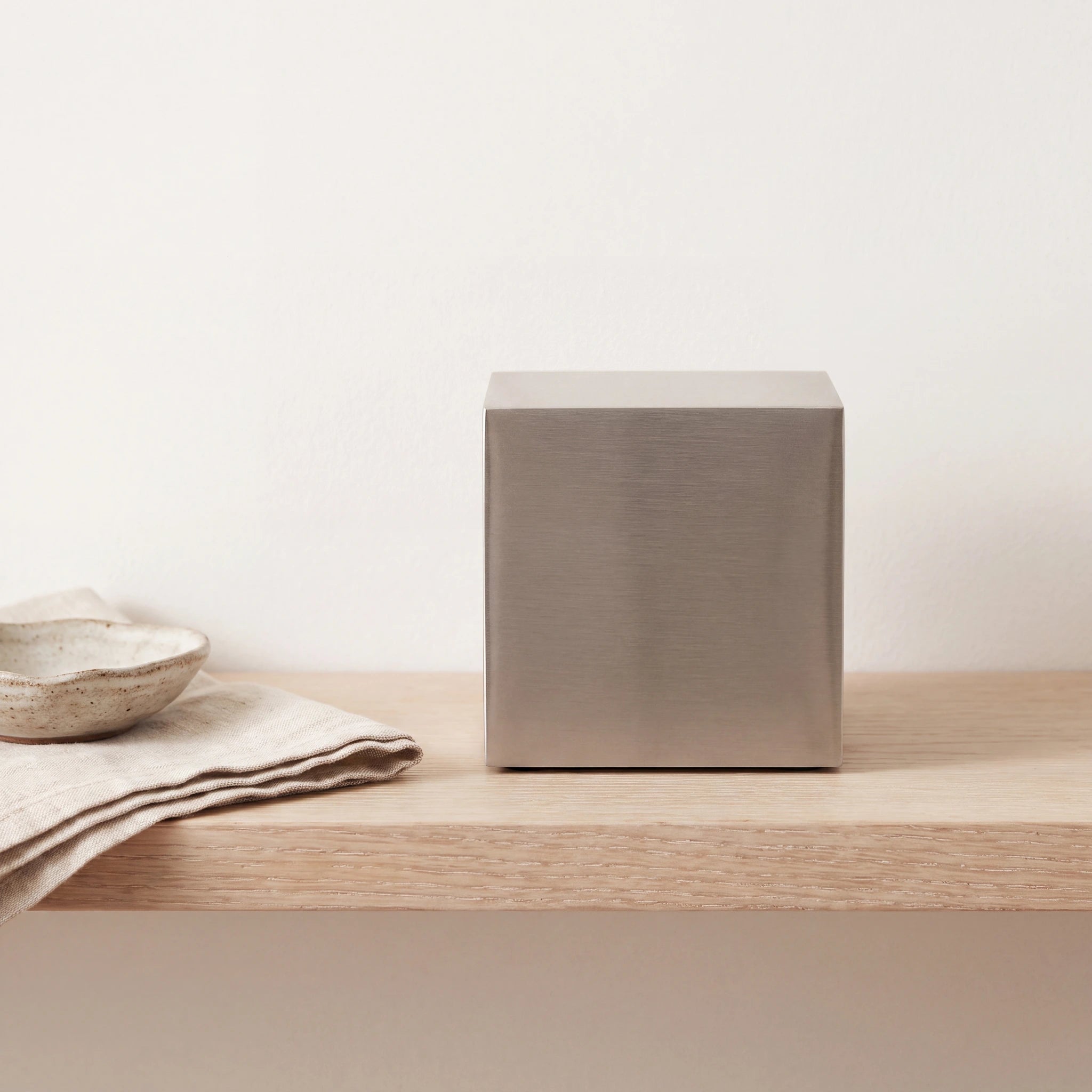 Cube-Extra-Small-Urn-for-Ashes-in-Stainless-Steel-keepsake_folded_napkin