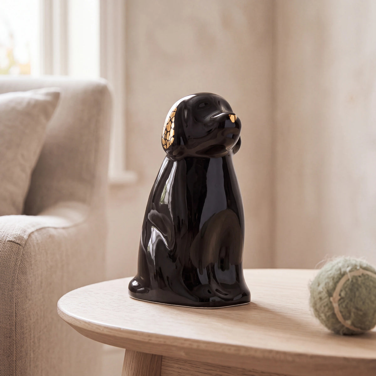 Cuddle-Dog-Urn-for-Ashes-in-Black-pet_reading_nook
