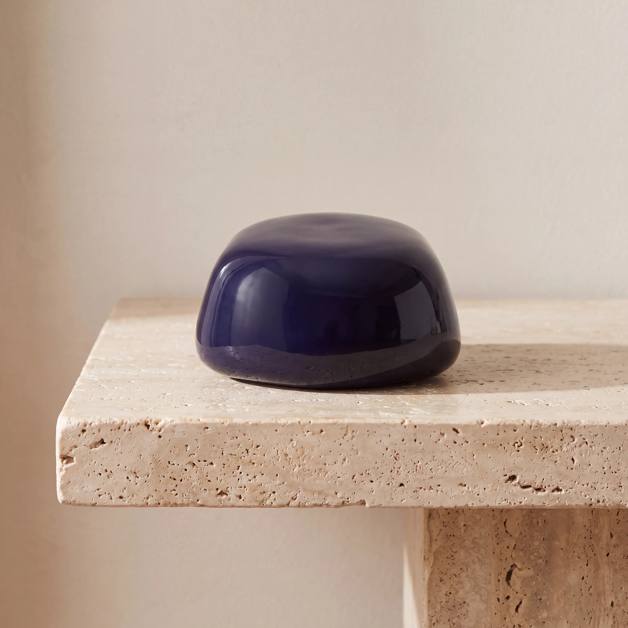 Cuddle-Stone-Keepsake-Urn-for-Ashes-in-Dark-Blue-Travertine-Ledge