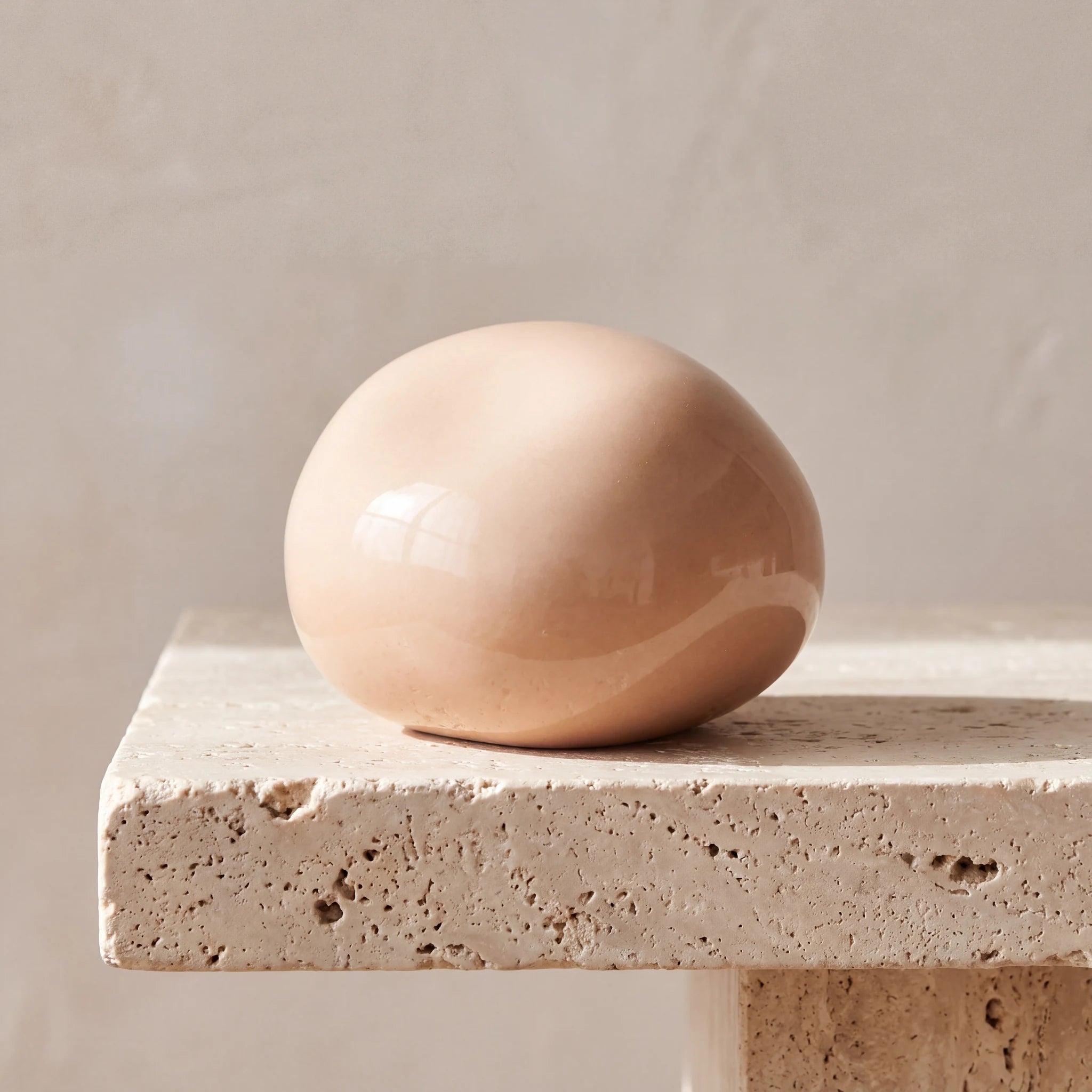Cuddle-Stone-Keepsake-Urn-for-Ashes-in-Glossy-Sand-Travertine-Ledge