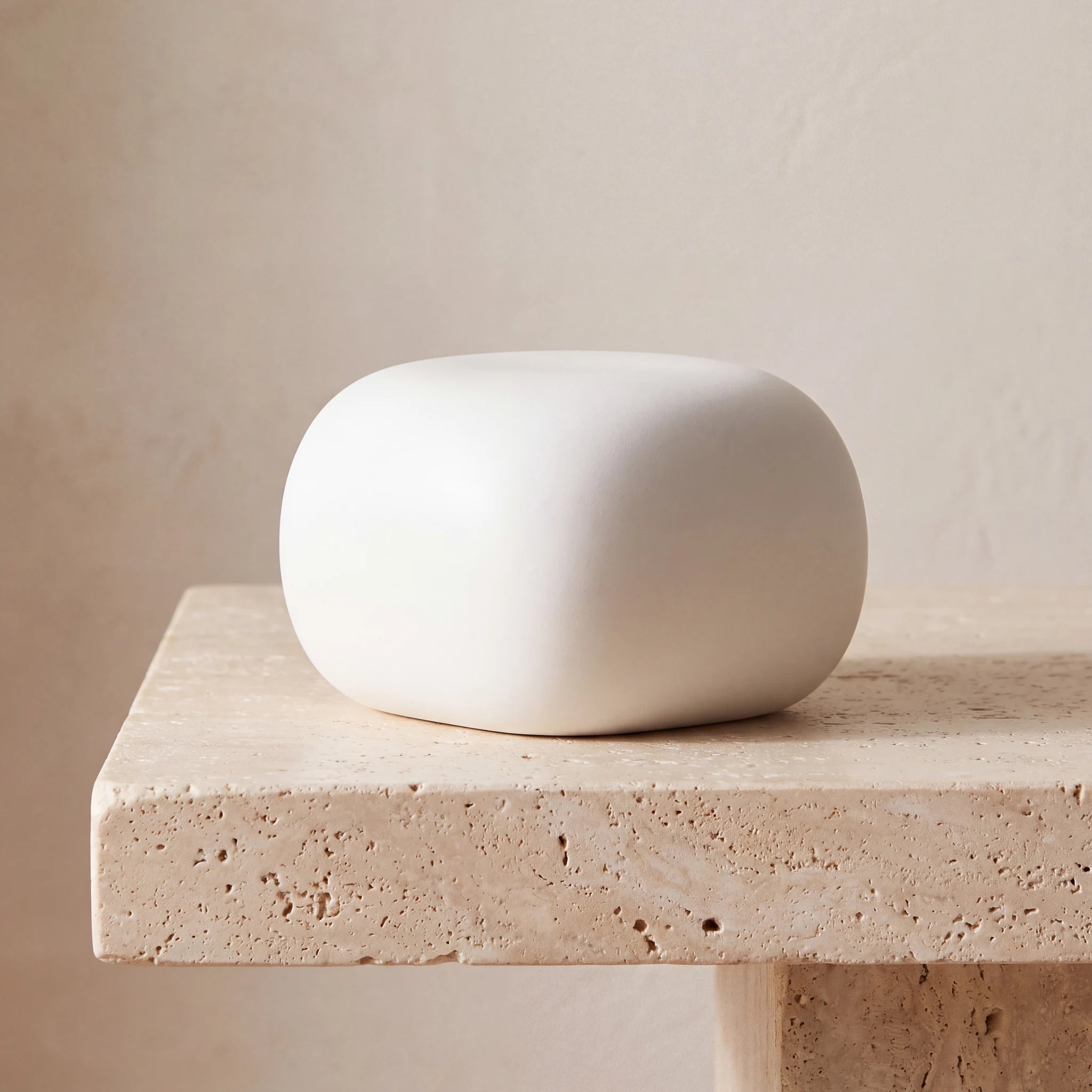 Cuddle-Stone-Keepsake-Urn-for-Ashes-in-Matte-White-Travertine-Ledge
