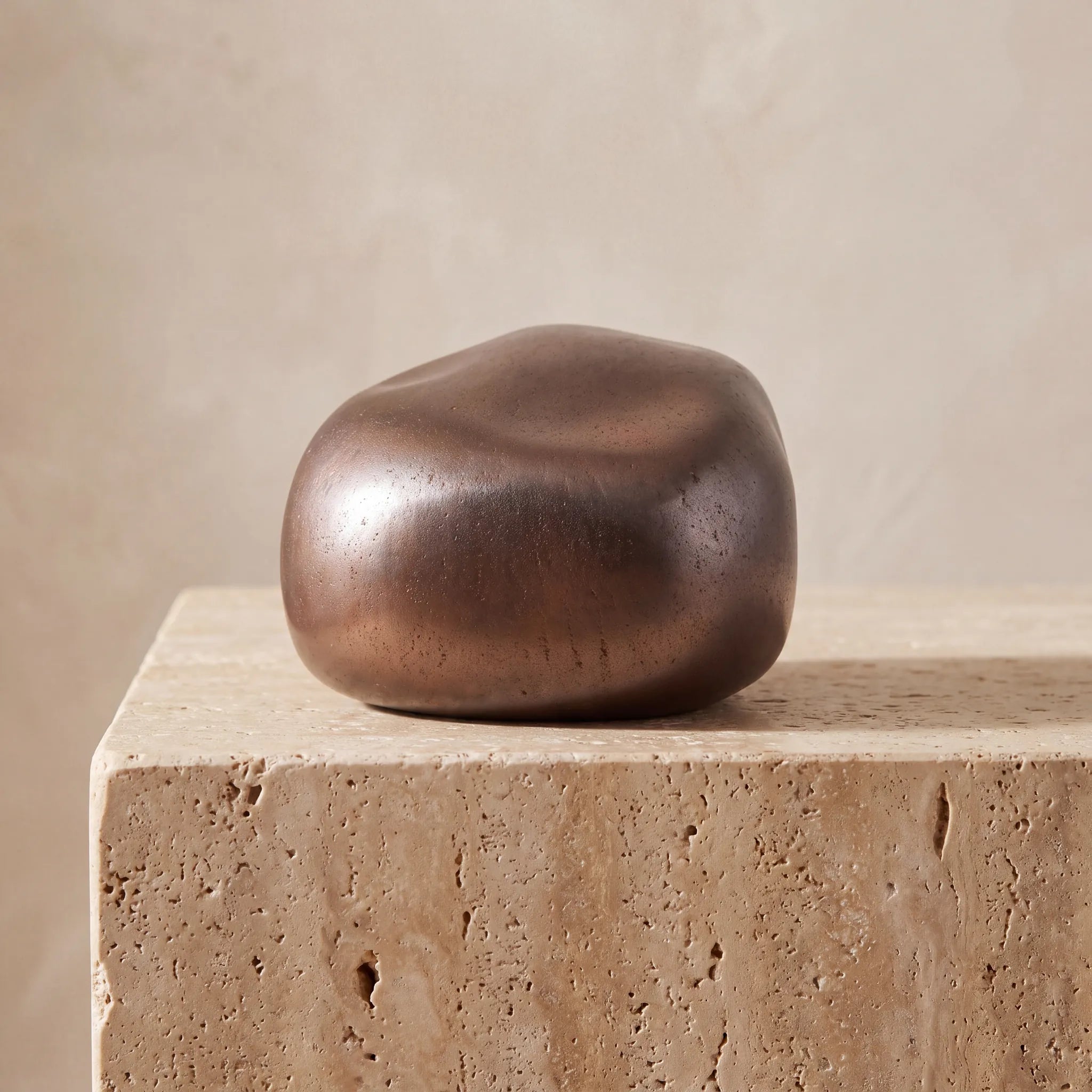 Cuddle-Stone-Keepsake-Urn-for-Ashes-in-Rustic-Bronze-Travertine-Ledge