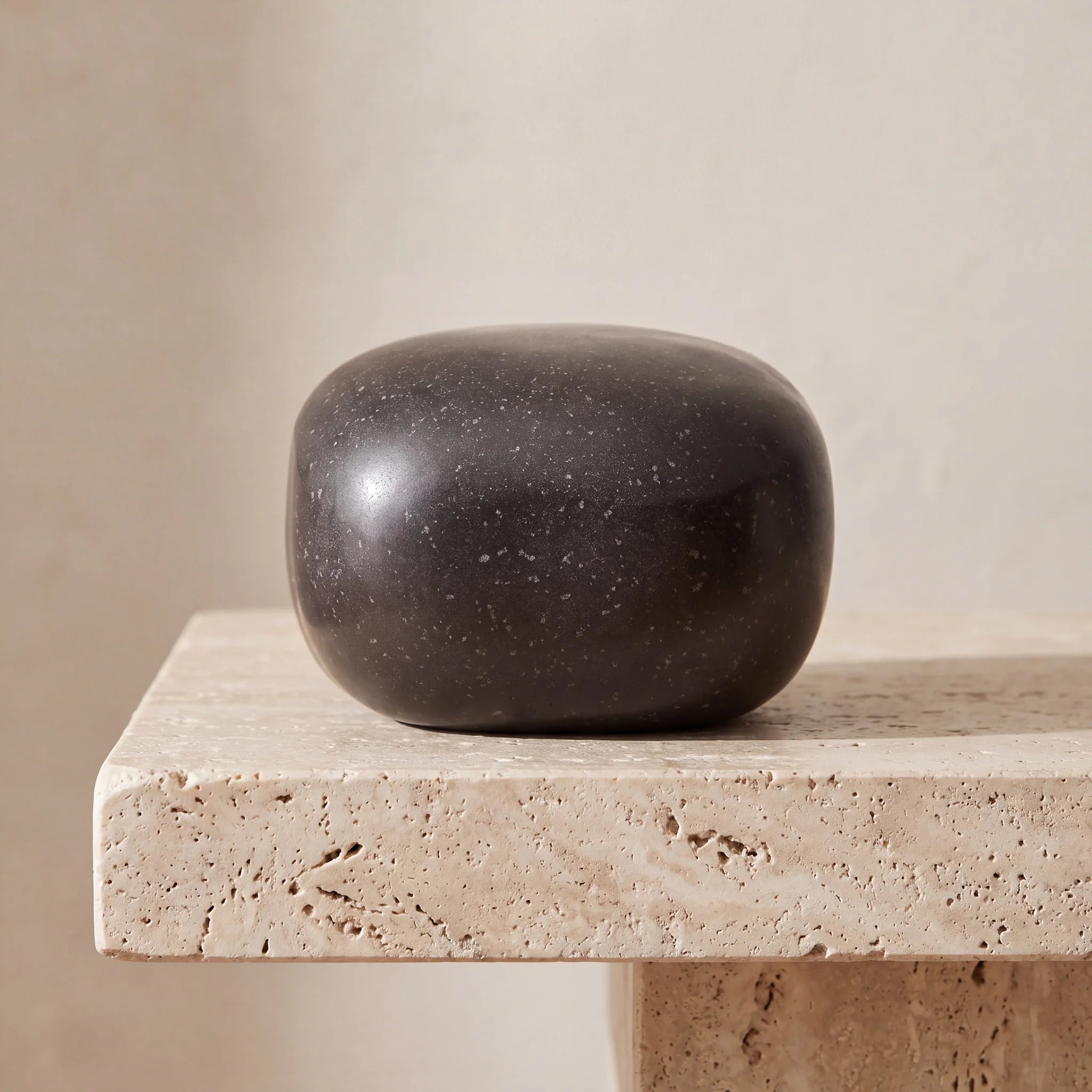 Cuddle-Stone-Keepsake-Urn-for-Ashes-in-Steel-Grey-Travertine-Ledge