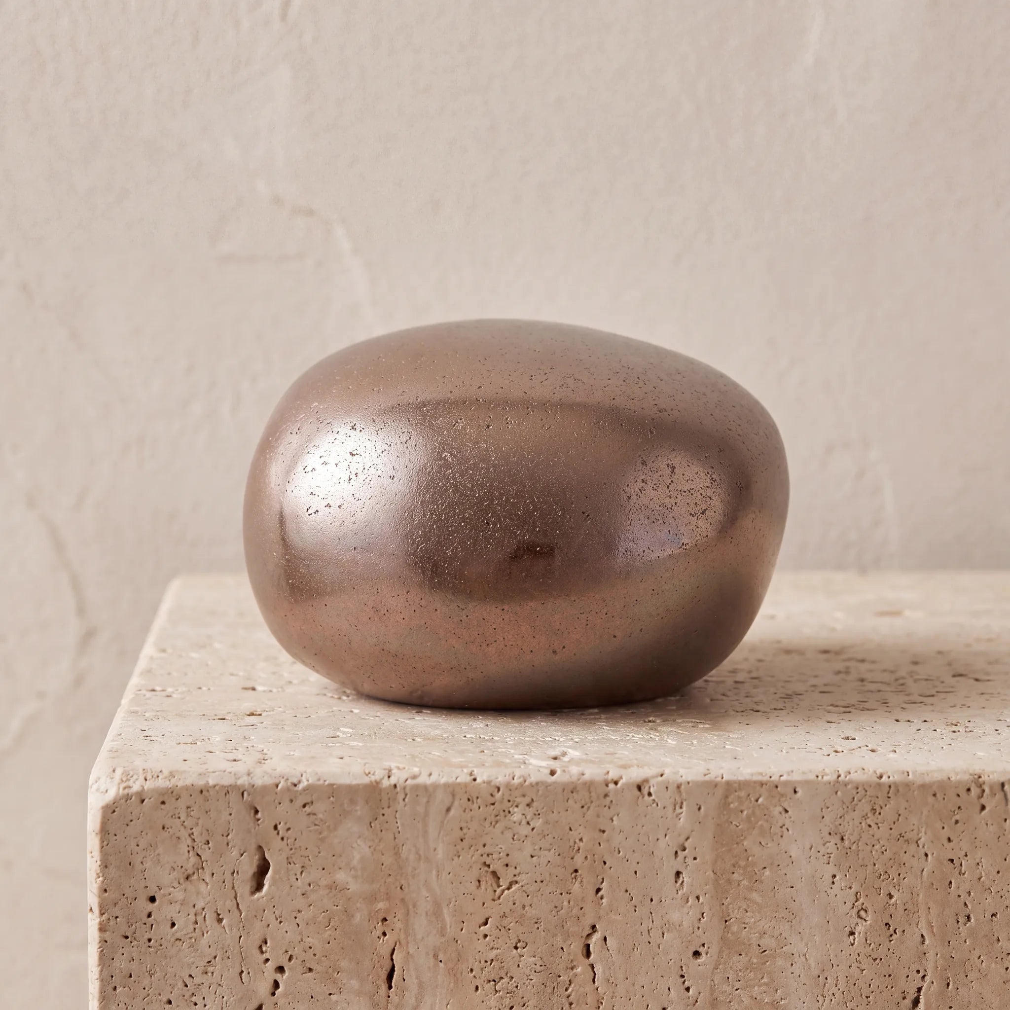Cuddle-Stone-Keepsake-Urn-for-Ashes-in-Warm-Bronze-Travertine-Ledge