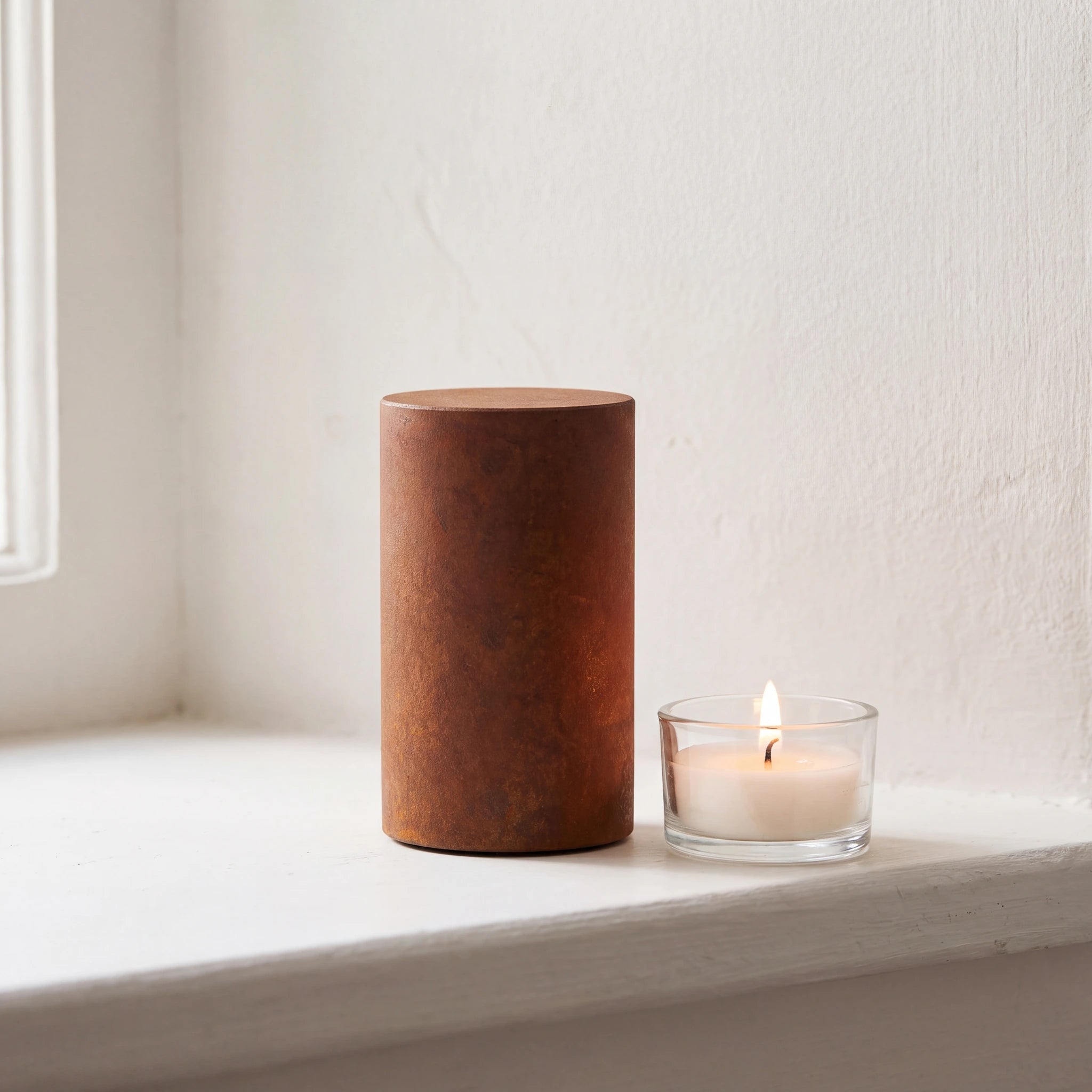 Cylinder-Small-Urn-for-Ashes-in-Corten-Steel-keepsake_tealight_ledge