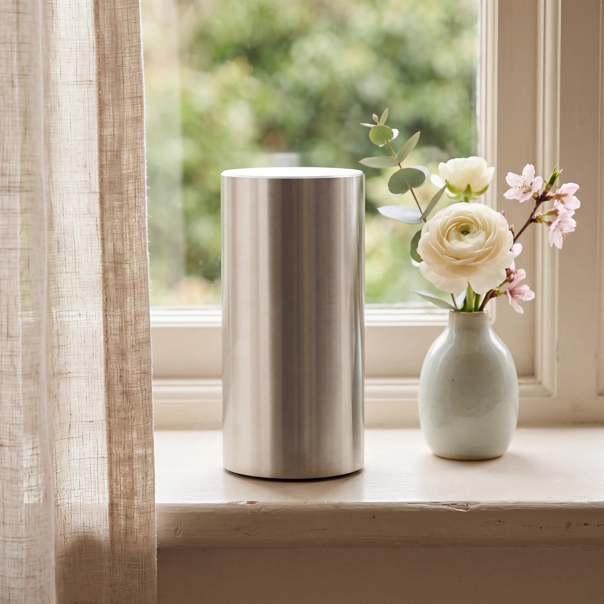 Cylinder-Small-Urn-for-Ashes-in-Stainless-Steel-keepsake_windowsill_posy