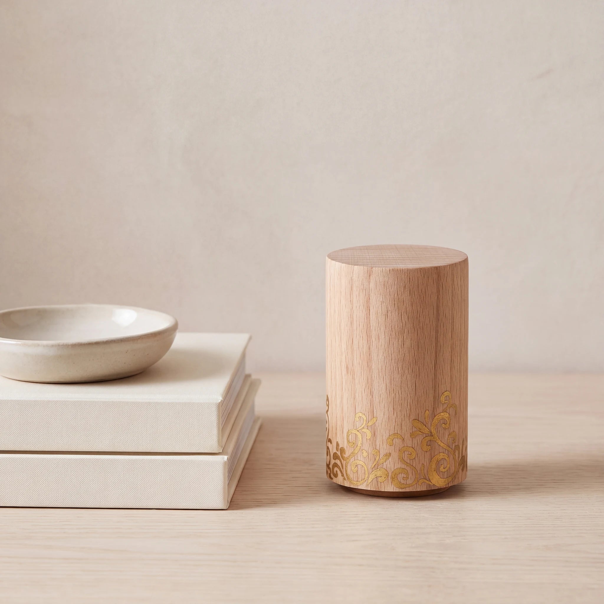 Cylinder-Wooden-Keepsake-Urn-for-Ashes-with-Gold-Detail-keepsake_books_dish