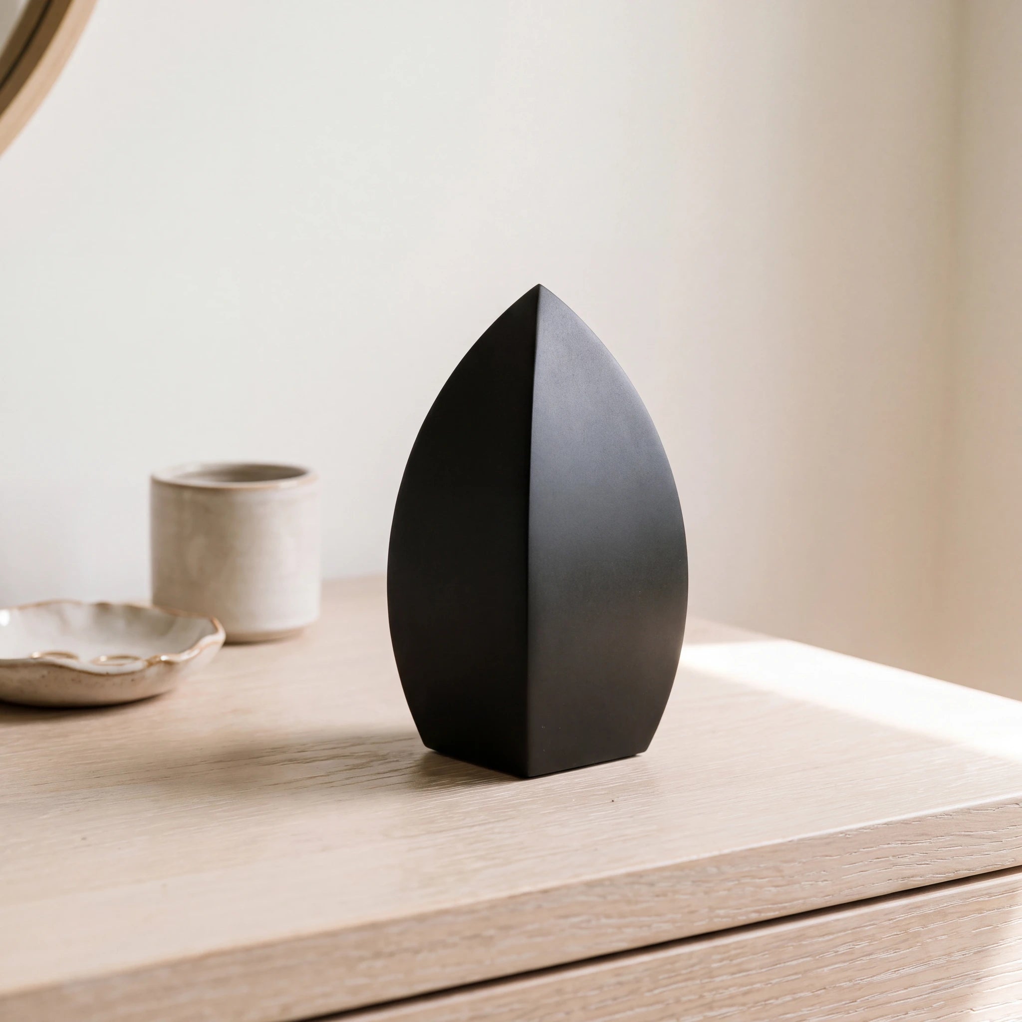 Drop-Extra-Small-Urn-for-Ashes-in-Matte-Black-Stainless-Steel-keepsake_dresser_beads