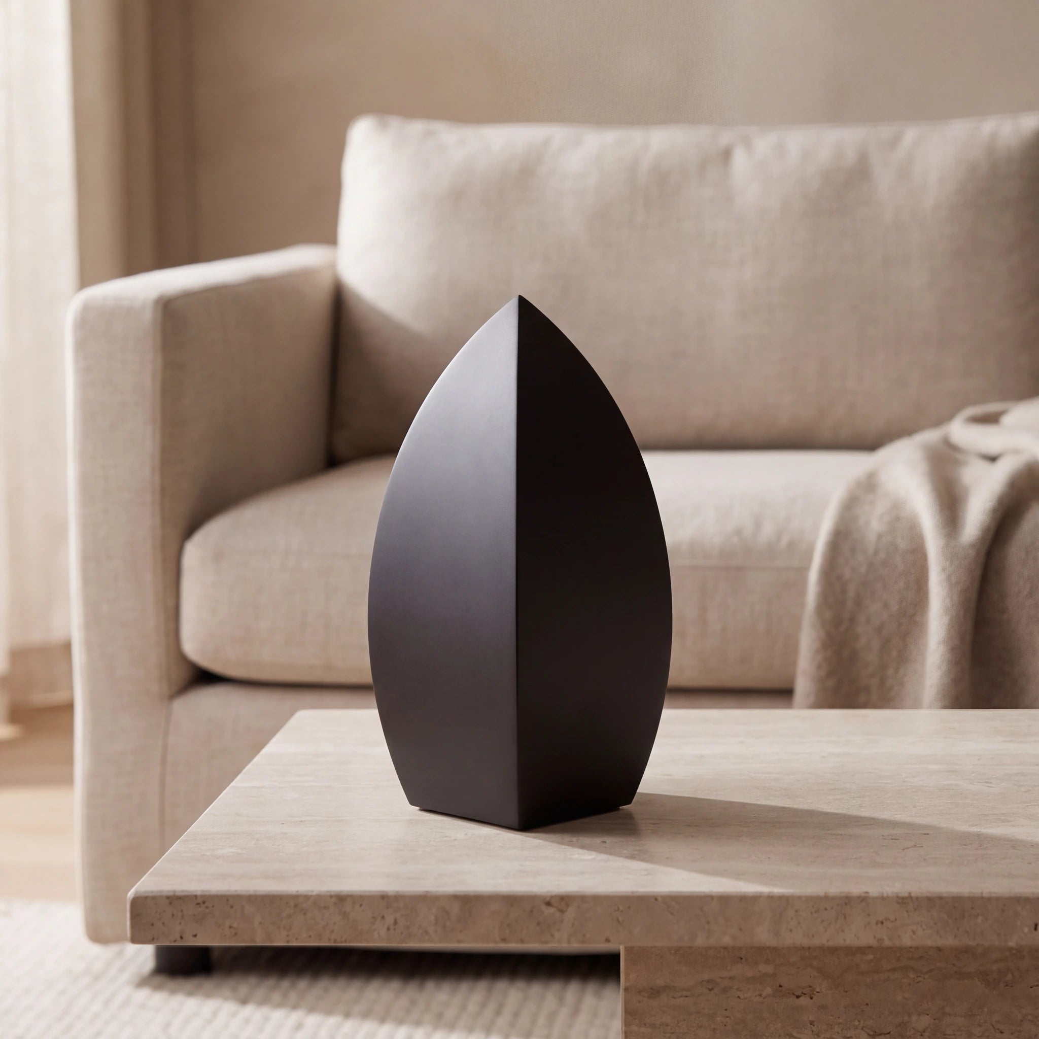 Drop-Medium-Urn-for-Ashes-in-Matte-Black-Stainless-Steel-amto_stone_coffee