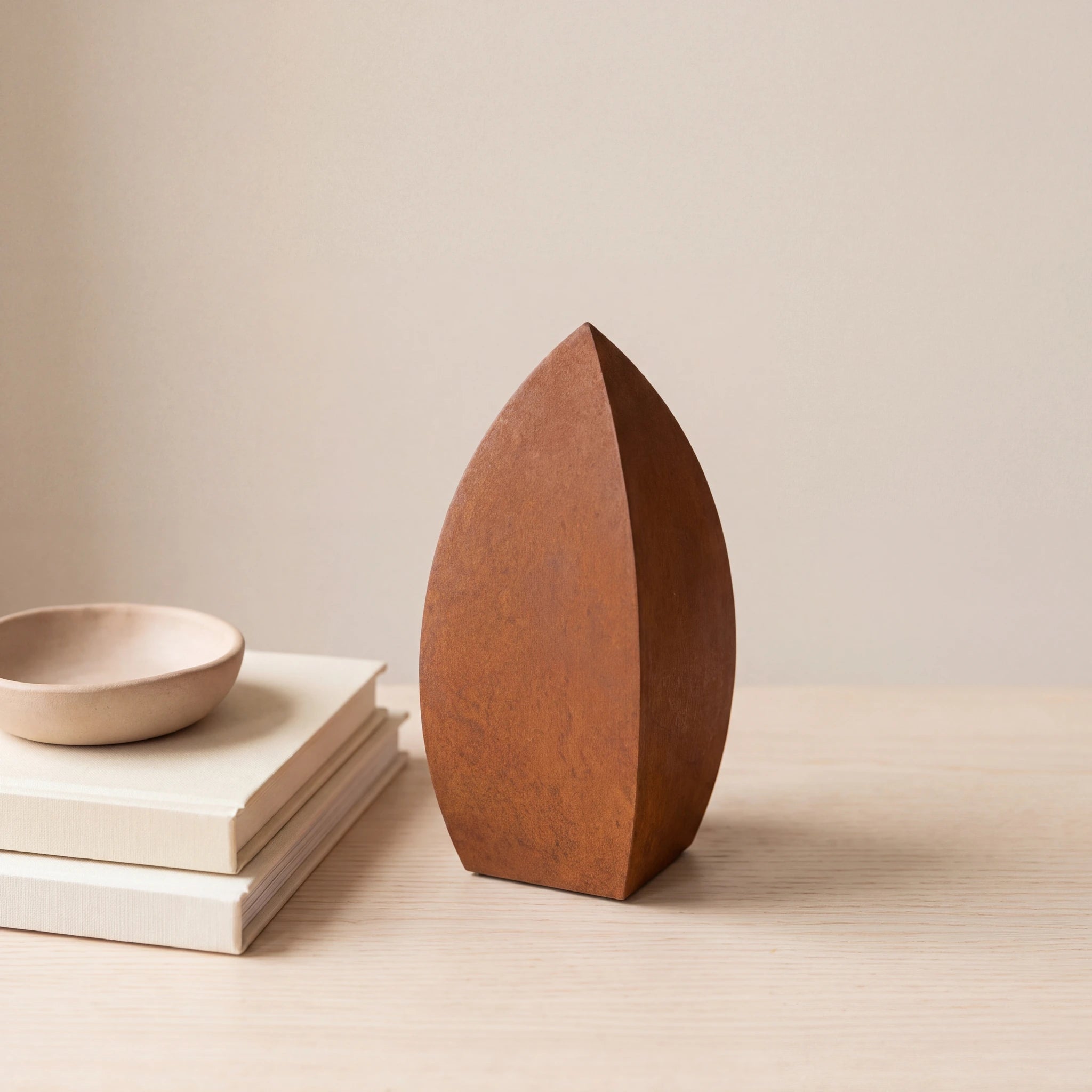 Drop-Pet-Urn-for-Ashes-in-Corten-Steel-keepsake_books_dish