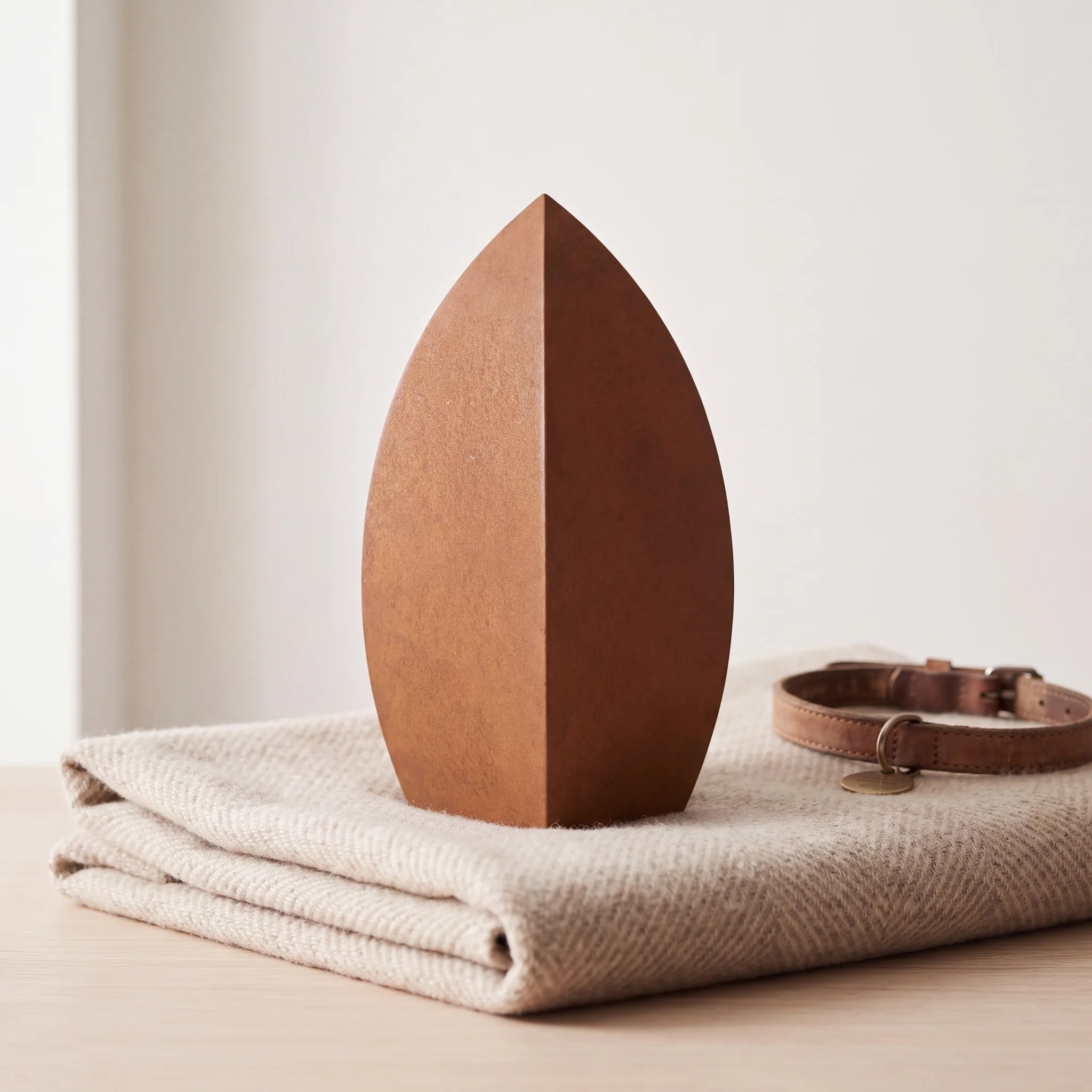 Drop-Pet-Urn-for-Ashes-in-Corten-Steel-pet_blanket_fold