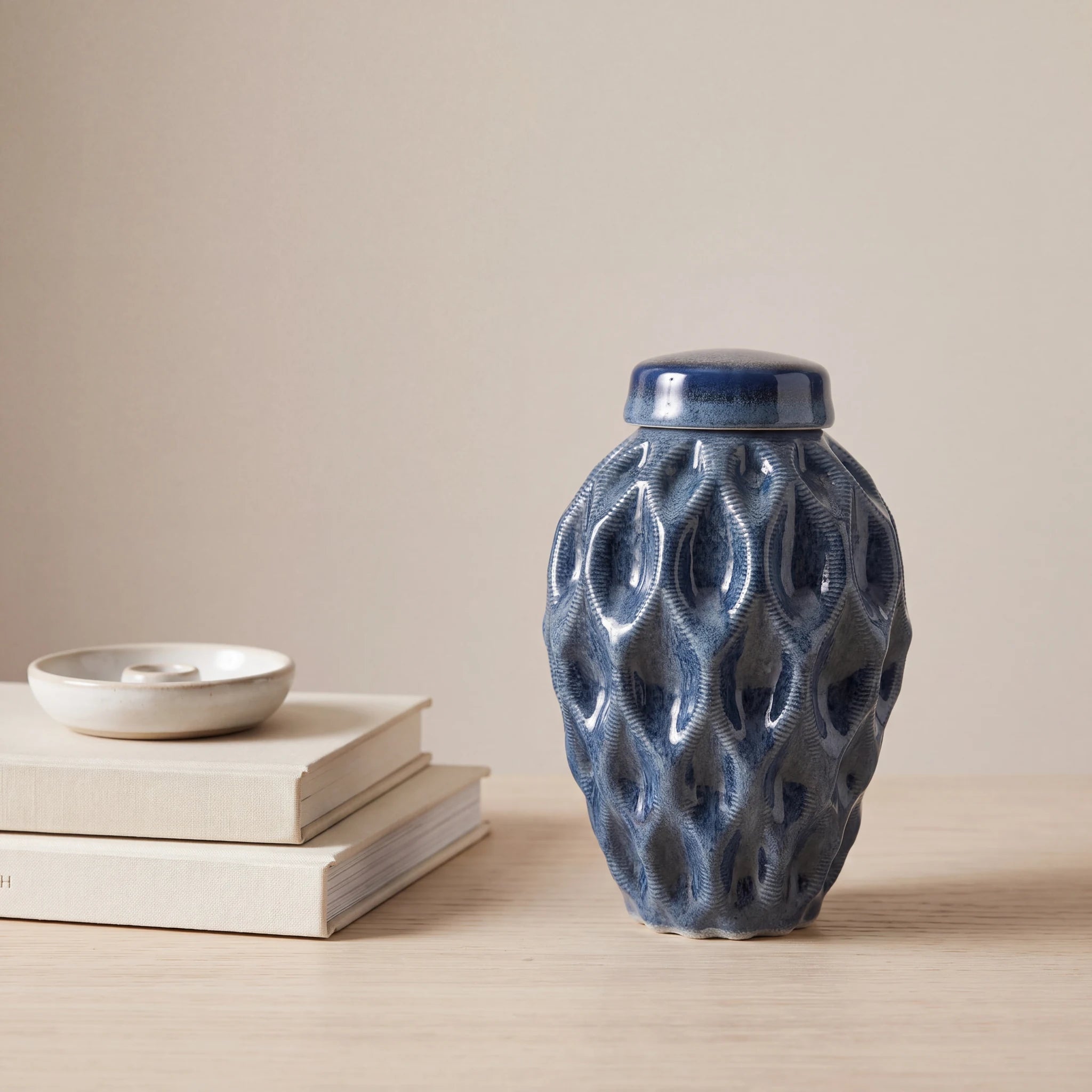 Echo-Keepsake-Urn-for-Ashes-in-Blue-keepsake_books_dish-Left-Angle