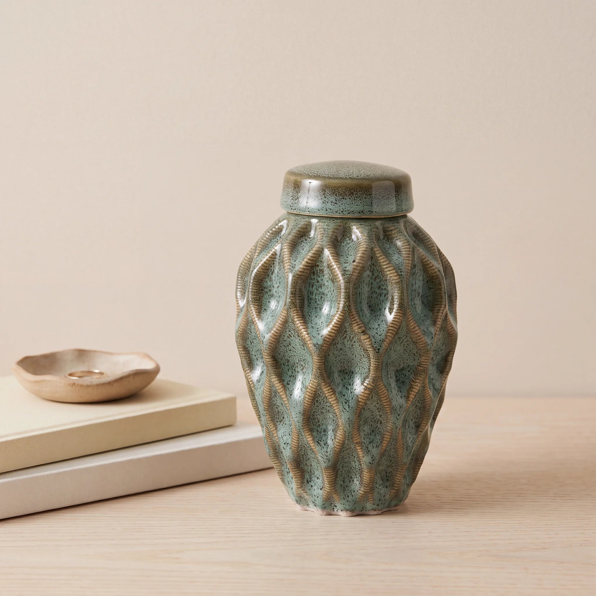 Echo-Keepsake-Urn-for-Ashes-in-Oily-Green-keepsake_books_dish-Left-Angle