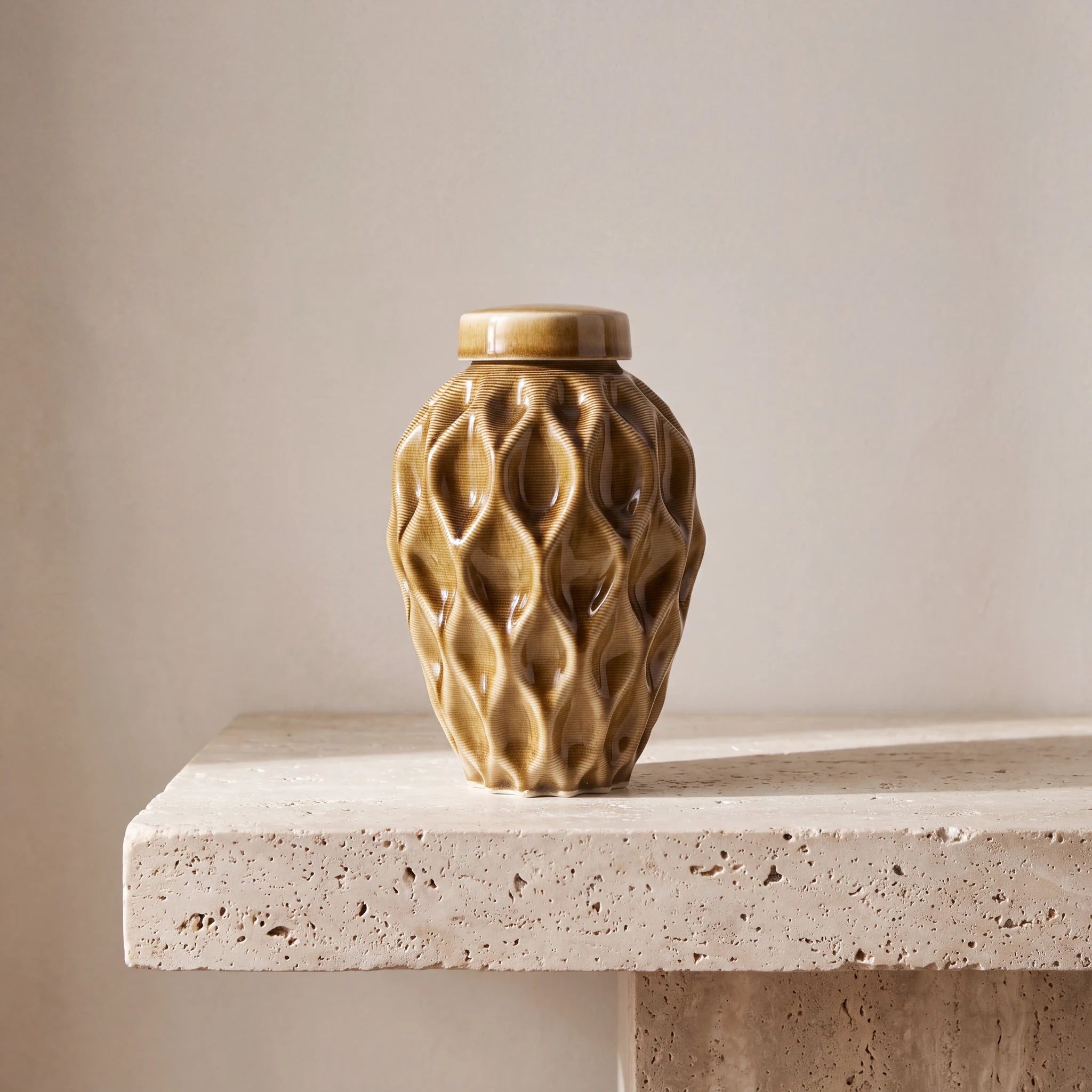 Echo-Medium-Urn-for-Ashes-in-Dark-Sand-Travertine-Ledge