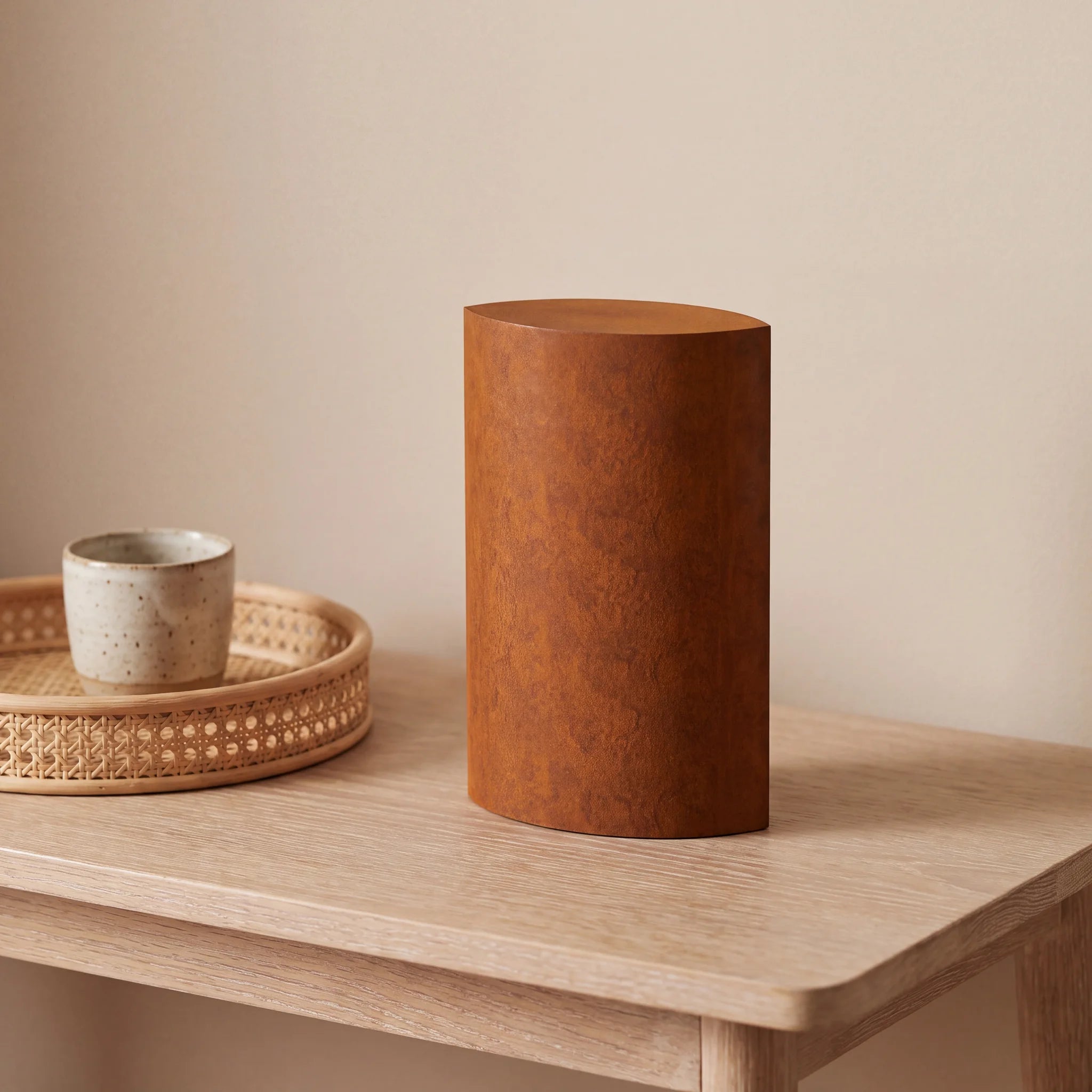 Ellipse-Small-Urn-for-Ashes-in-Corten-Steel-Cane-Tray