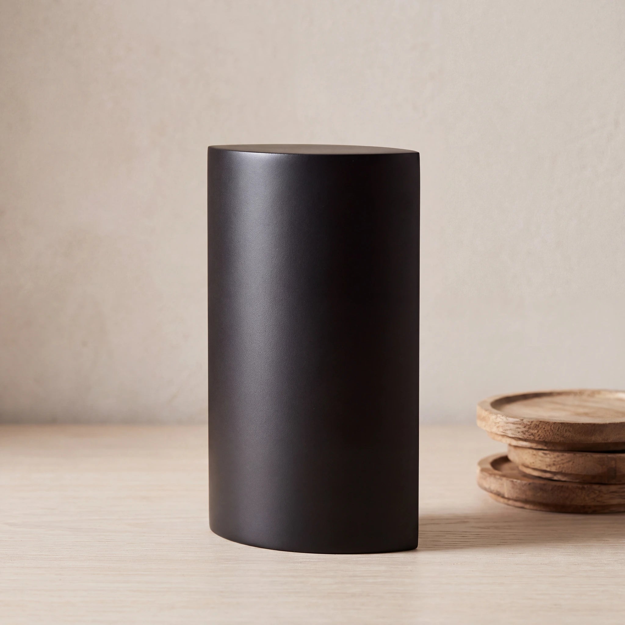 Ellipse-Small-Urn-for-Ashes-in-Matte-Black-Stainless-Steel-keepsake_stacked_coasters