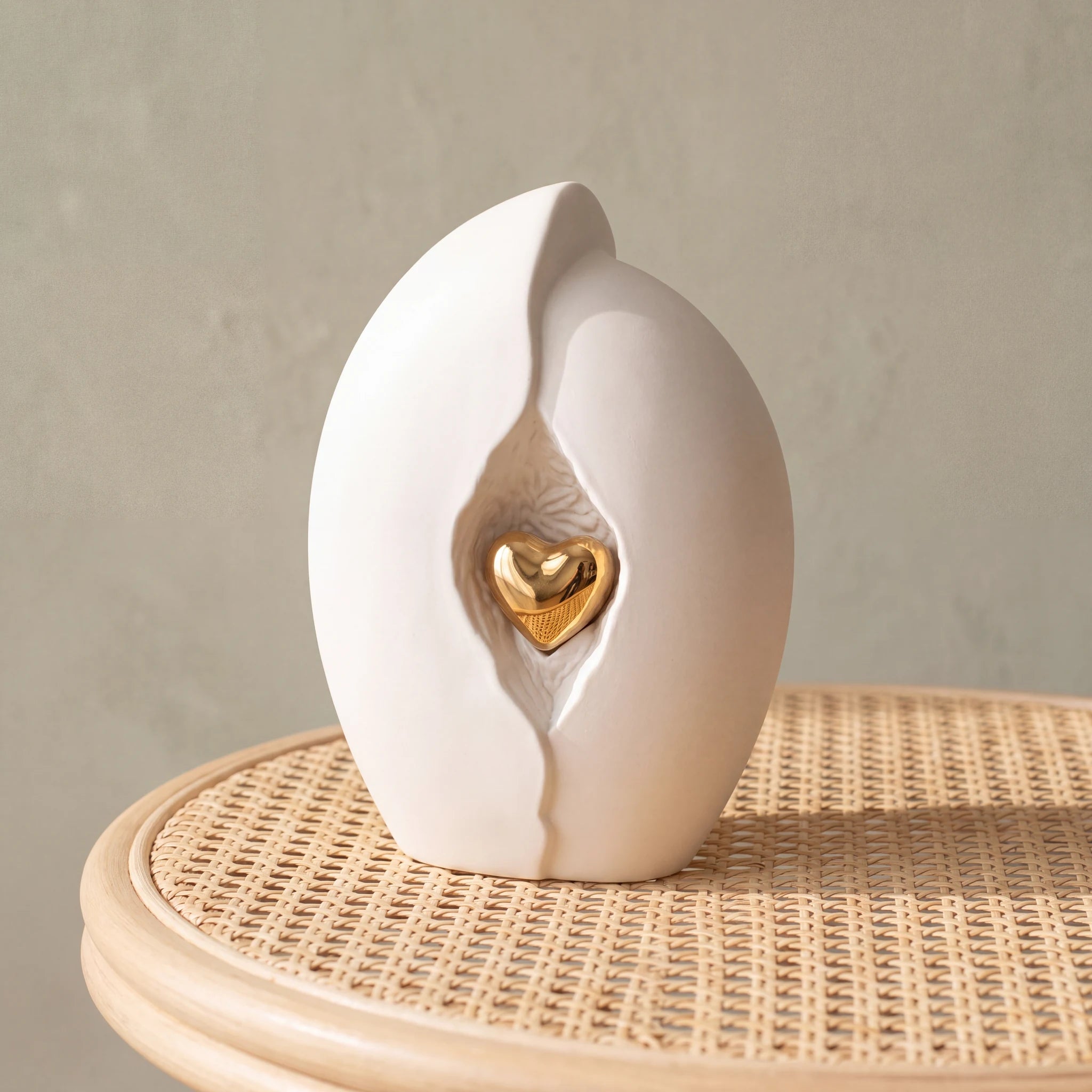 Embrace-Heart-Medium-Urn-for-Ashes-in-White-and-Gold-Cane-Table