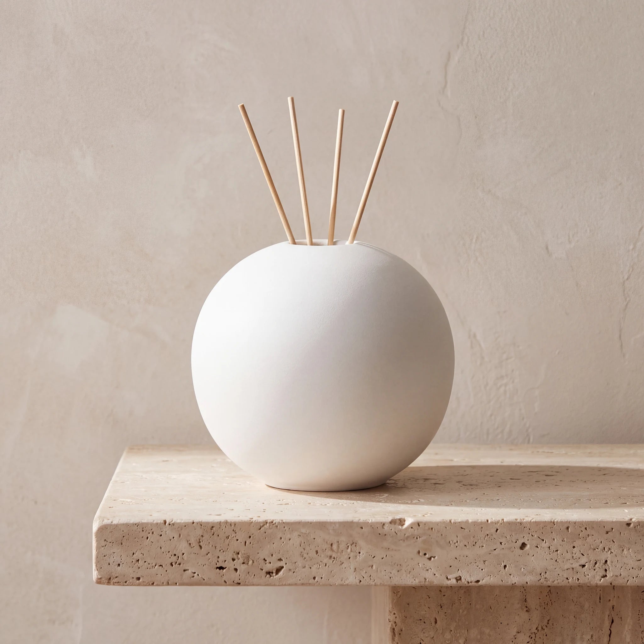Essence-of-Life-Scented-Medium-Urn-for-Ashes-in-White-Travertine-Ledge
