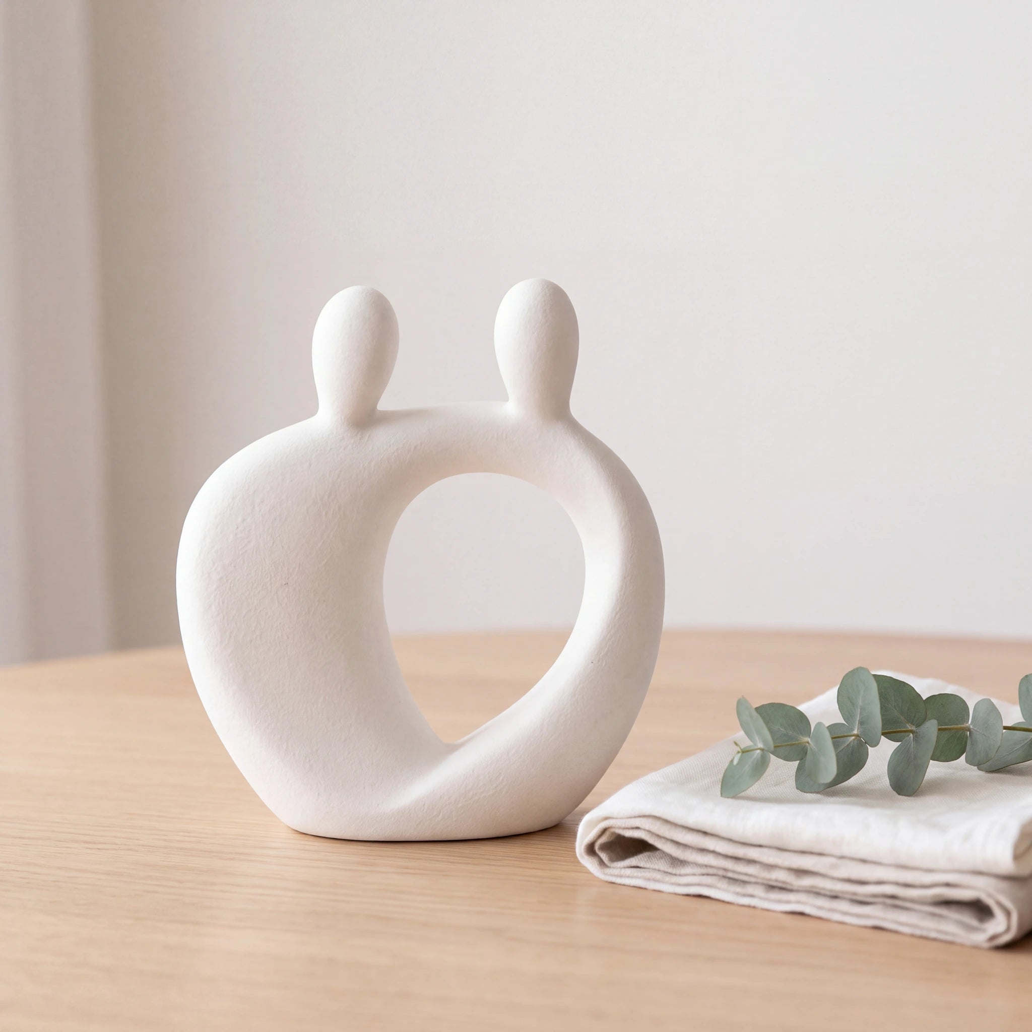 Family-Keepsake-Urn-for-Ashes-in-White-Folded-Linen