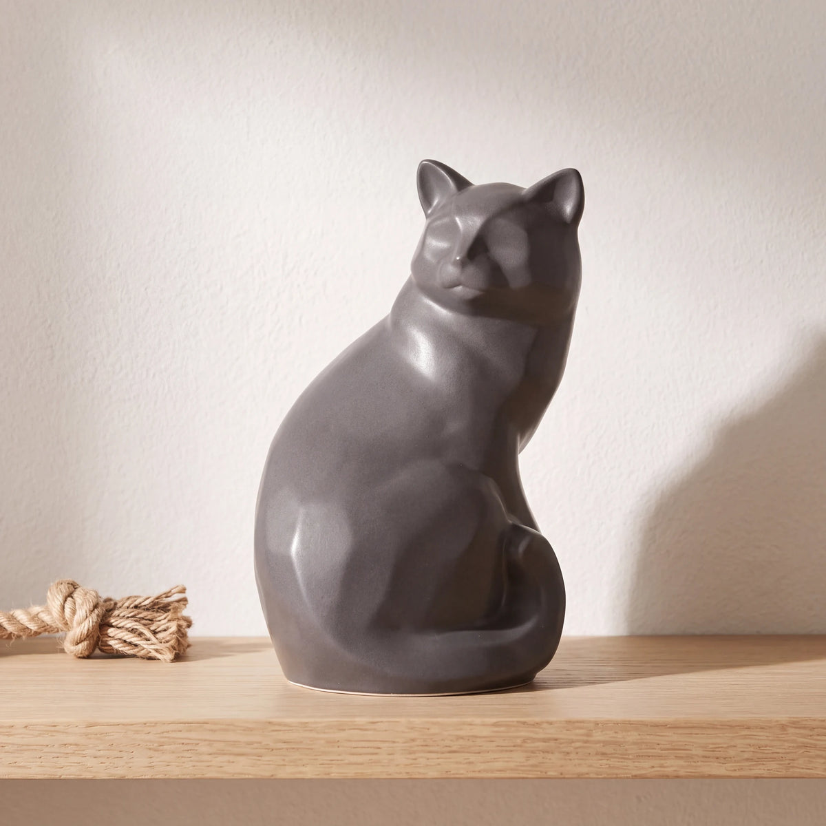 Felix-Cat-Urn-for-Ashes-in-Matte-Grey-pet_soft_toy_shelf