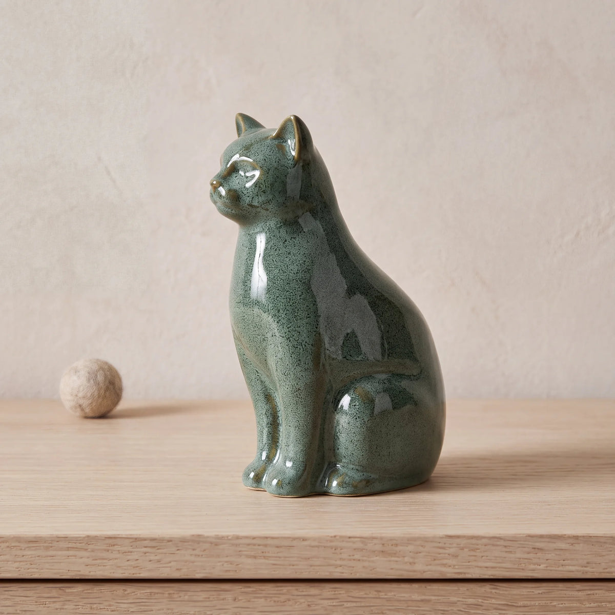 Felix-Cat-Urn-for-Ashes-in-Oily-Green-pet_console_ball