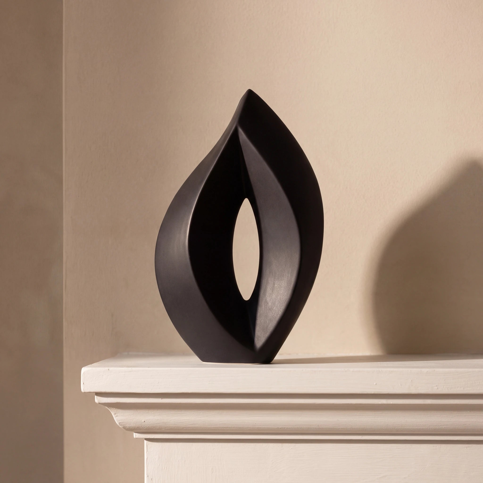 Flame-Medium-Urn-for-Ashes-in-Black-Mantelpiece