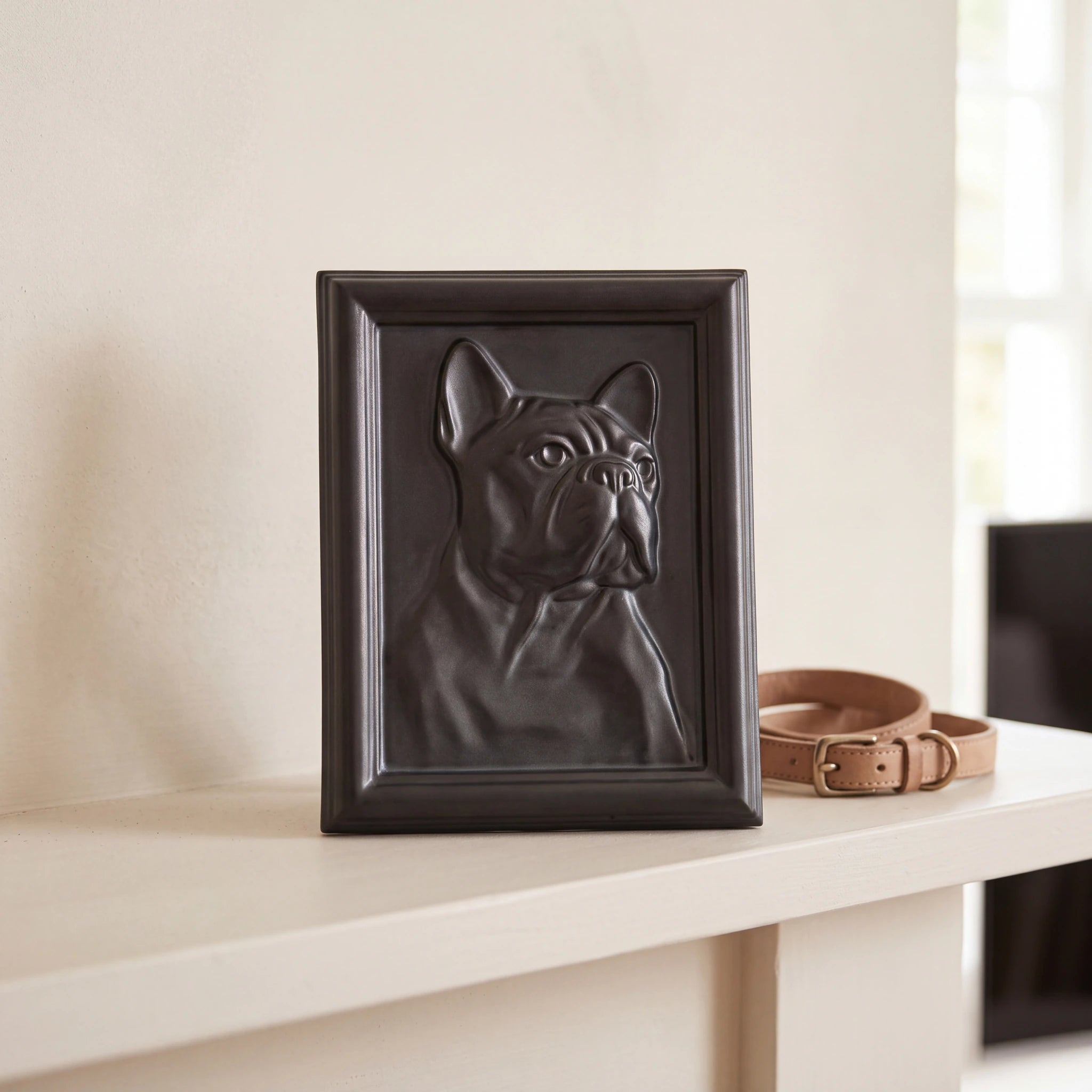 Frenchie-Portrait-Dog-Urn-for-Ashes-in-Matte-Black-On-the-Mantelpiece