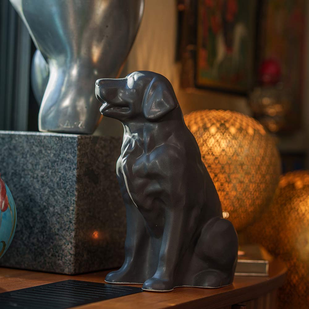 Golden Retriever Pet Urn for Ashes in Matte Grey on Shelf Looking Away
